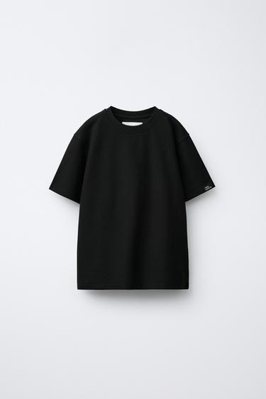 CAMISETA ESTRUCTURA ETIQUETA - Negro de Zara