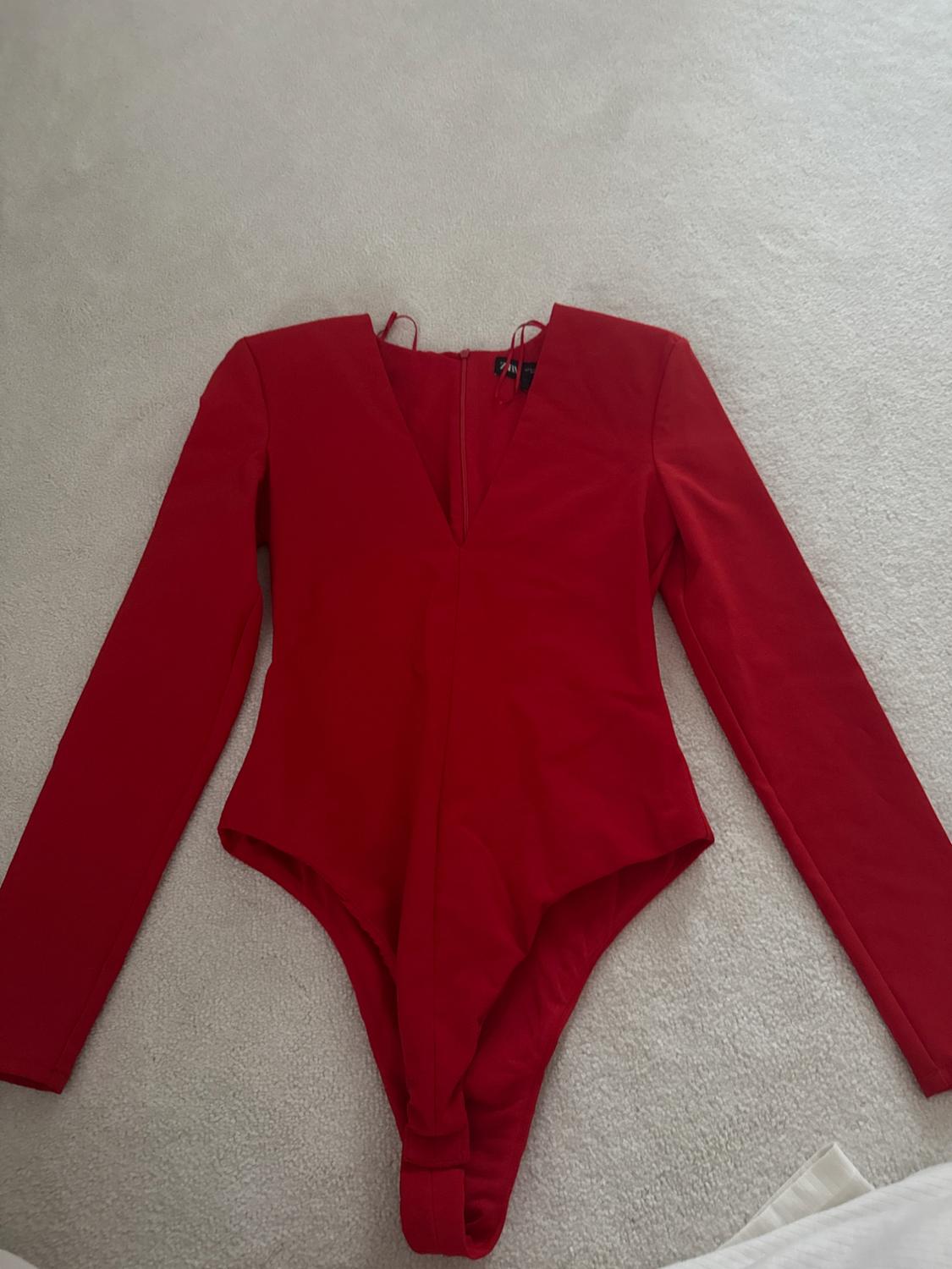 STRETCH BODYSUIT WITH SHOULDER PADS