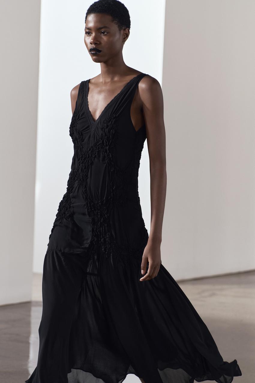 15 Ways to Style a Black Midi Dress - Haute Off The Rack