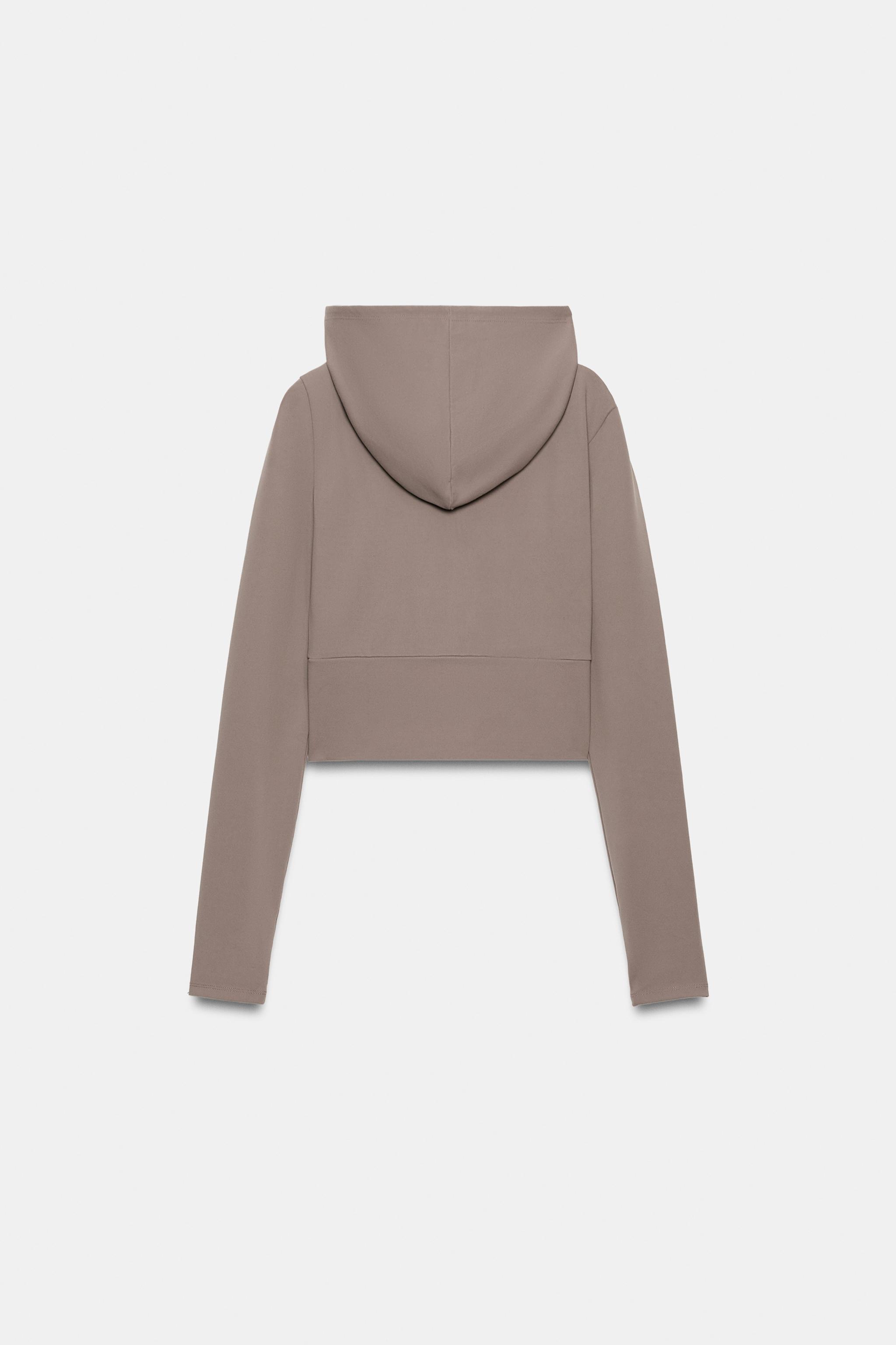 VESTE STRETCH CAPUCHE ZIP