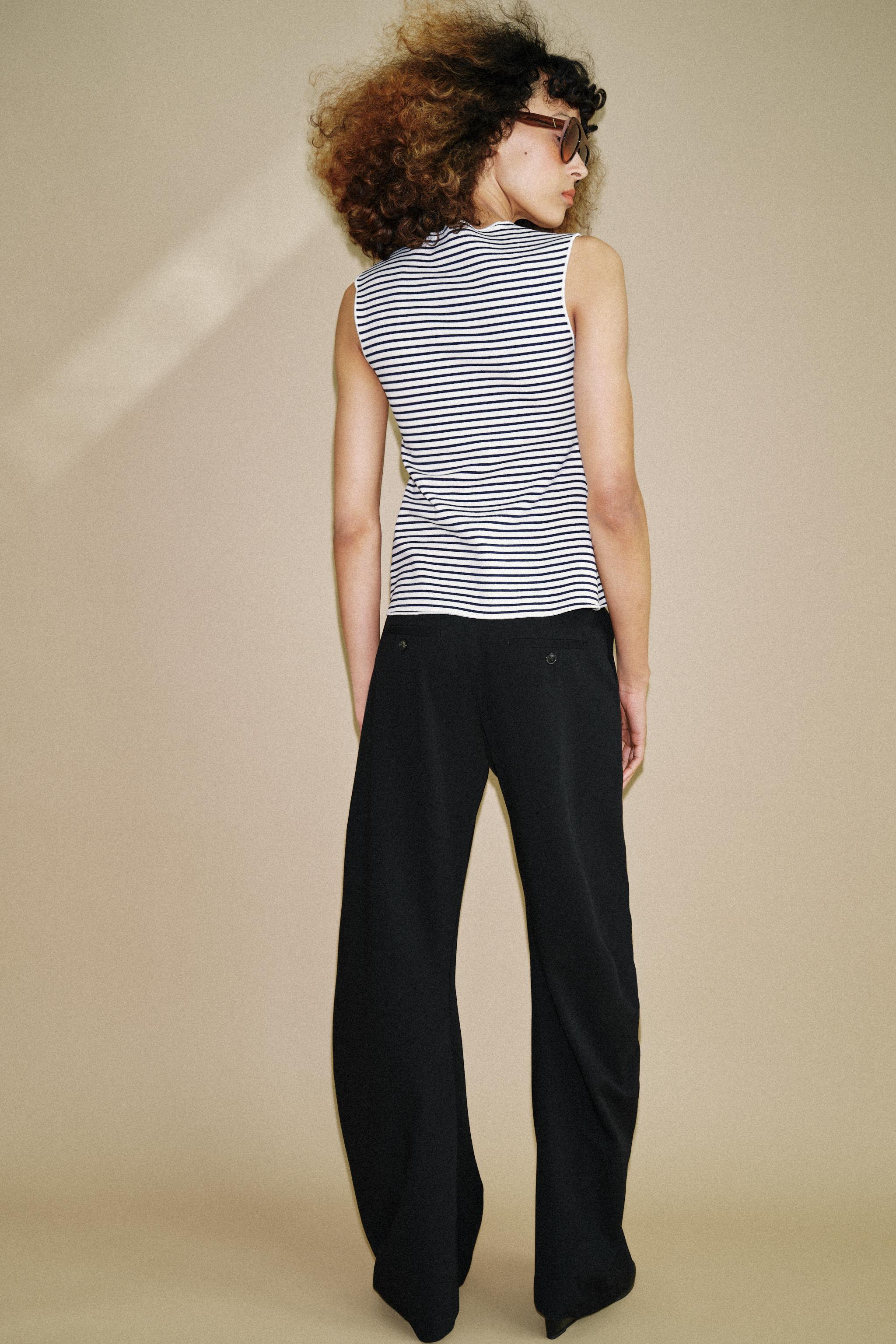 BUTTONED VEST TOP