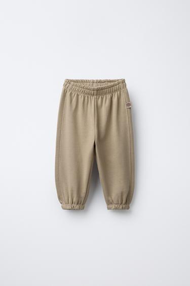 PACK DOS PANTALONES JOGGER FELPA ETIQUETA - Camel claro de Zara - Imagen 0