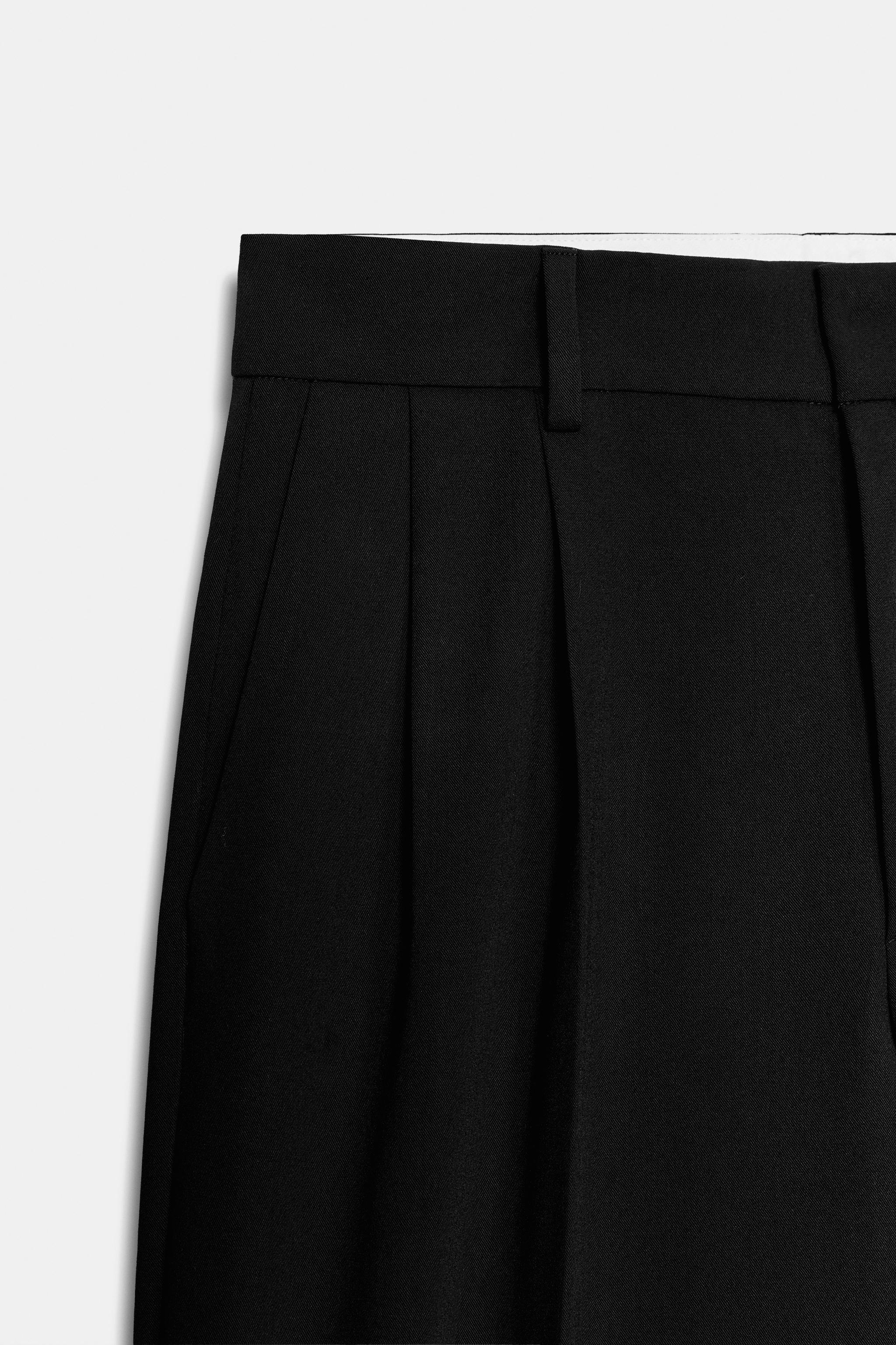 STRIPED PLEATED PANTS WITH FLAP POCKETS