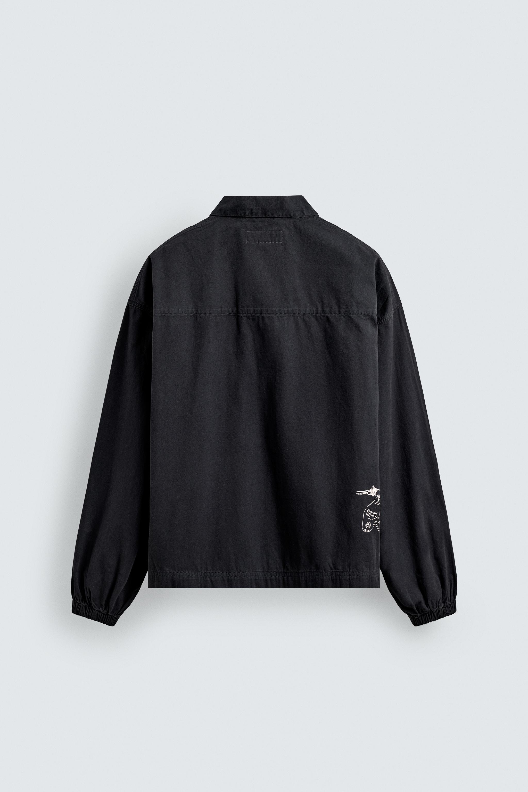 POLO À ZIP BRODÉ