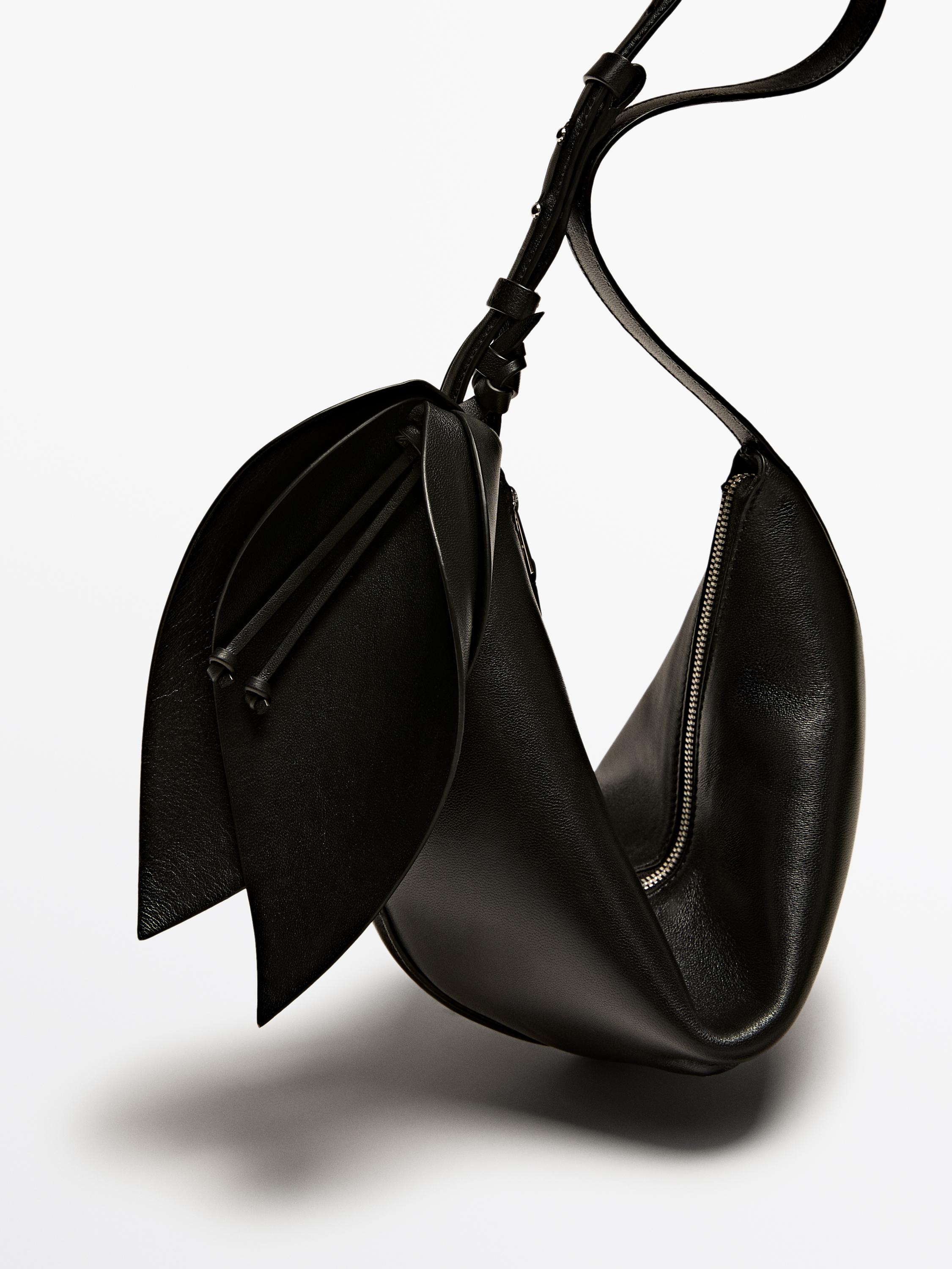 Nappa leather half-moon bag with flower detail
