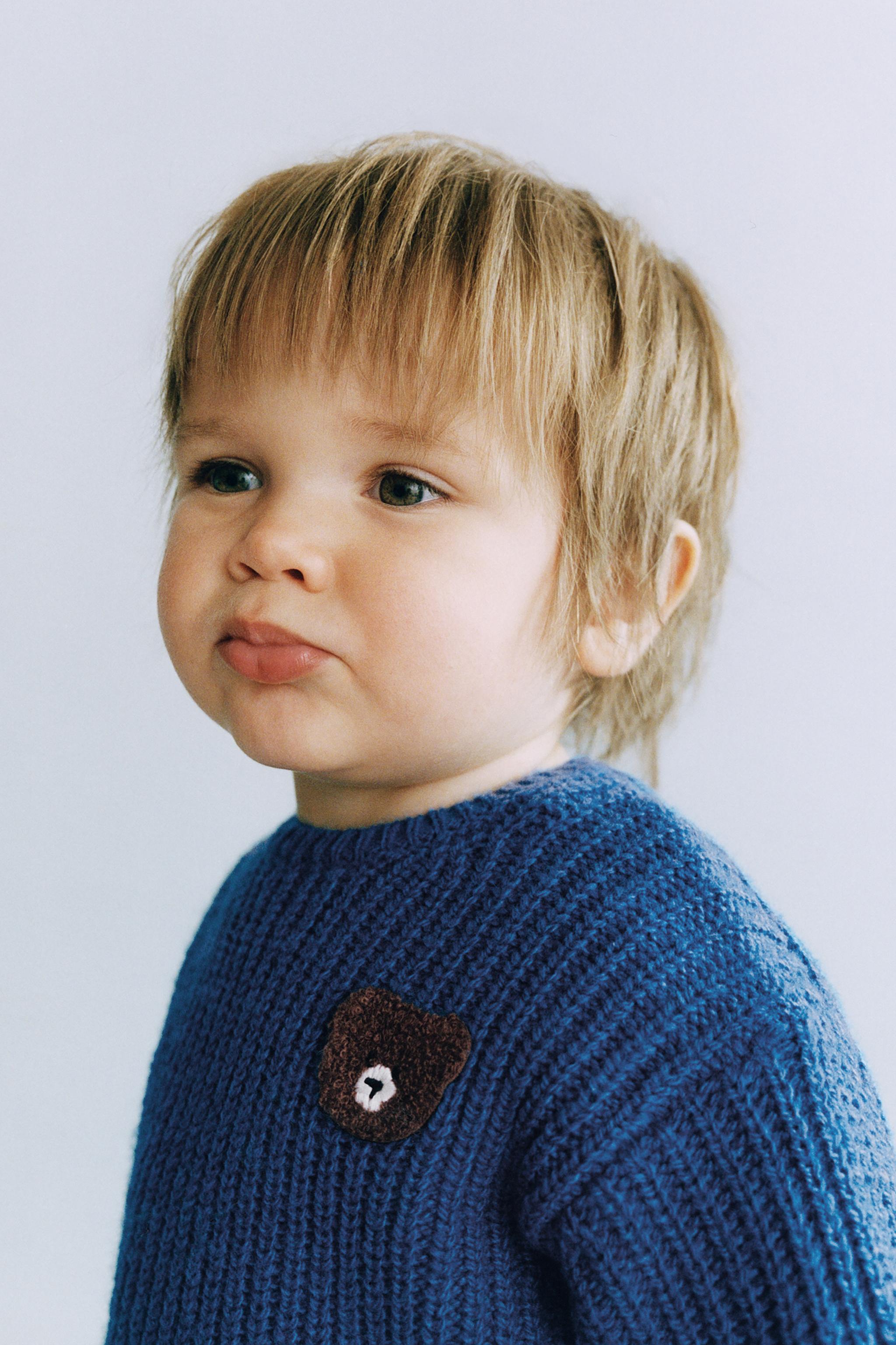 PULL EN MAILLE À PIÈCE OURS