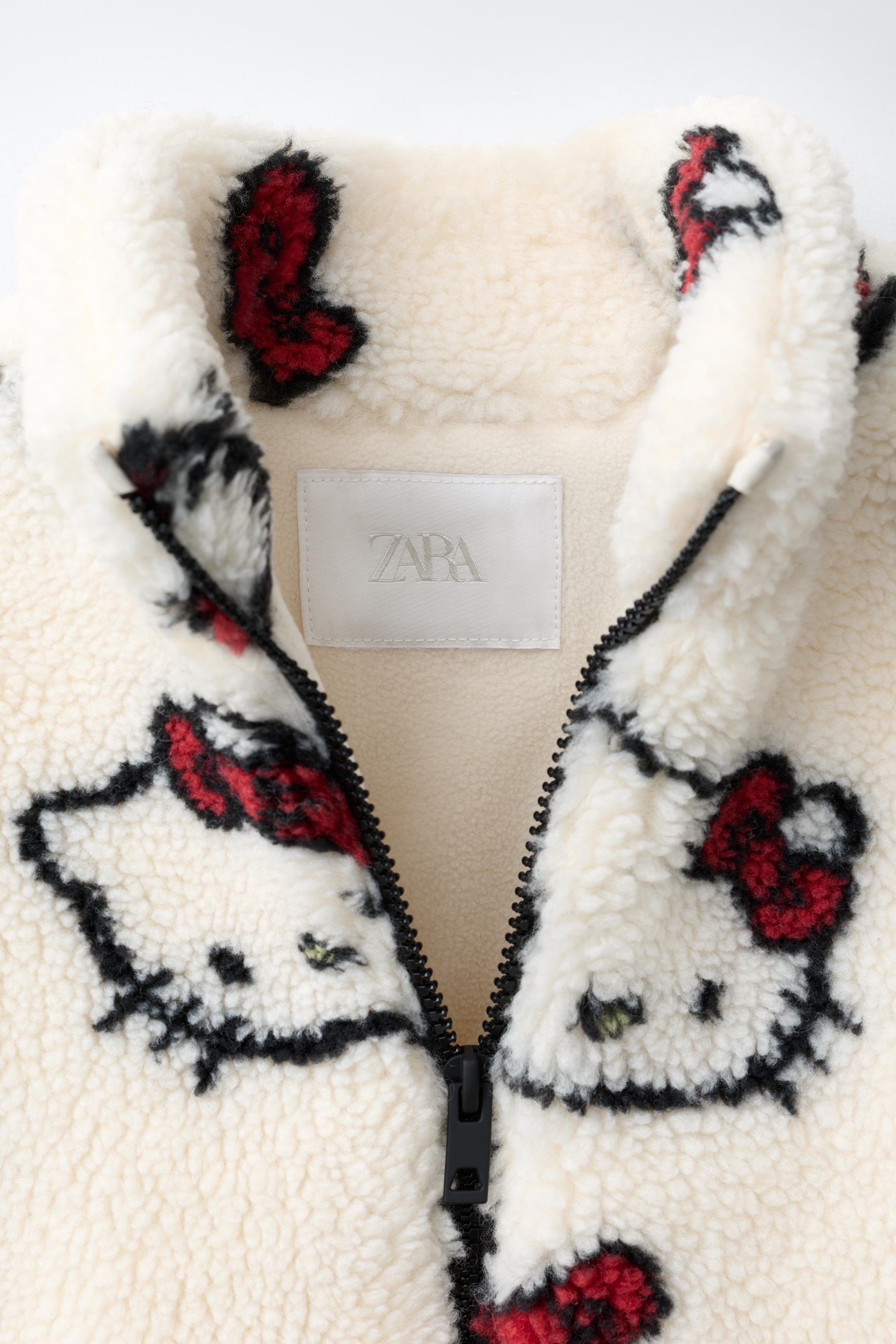 HELLO KITTY © SANRIO FAUX SHEARLING JACKET