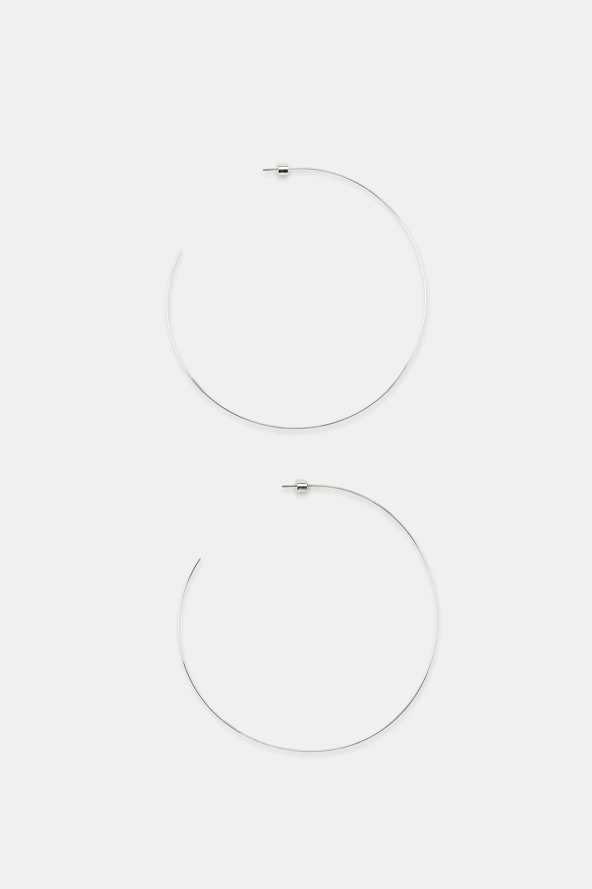 THIN MAXI HOOP EARRINGS — Silver