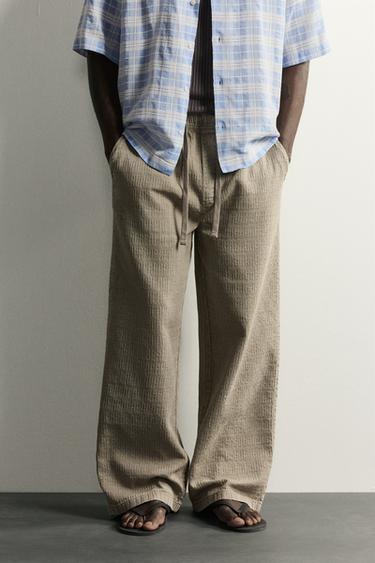 بنطلون RELAXED FIT جاكار مغسول - كاكي الخاص بـ Zara