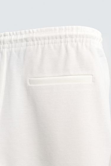 PANTALON STYLE JOGGING À TAILLE EASY CARE - Blanc cassé de Zara - Image 9