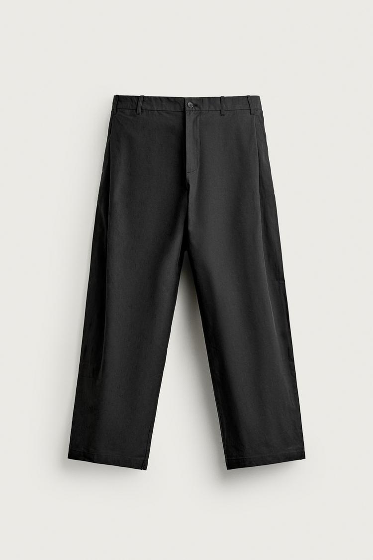 Pantalon straight fit pliegues laterales