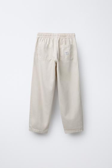 FLOWING ELASTICATED TROUSERS - Light beige by Zara - Image 1