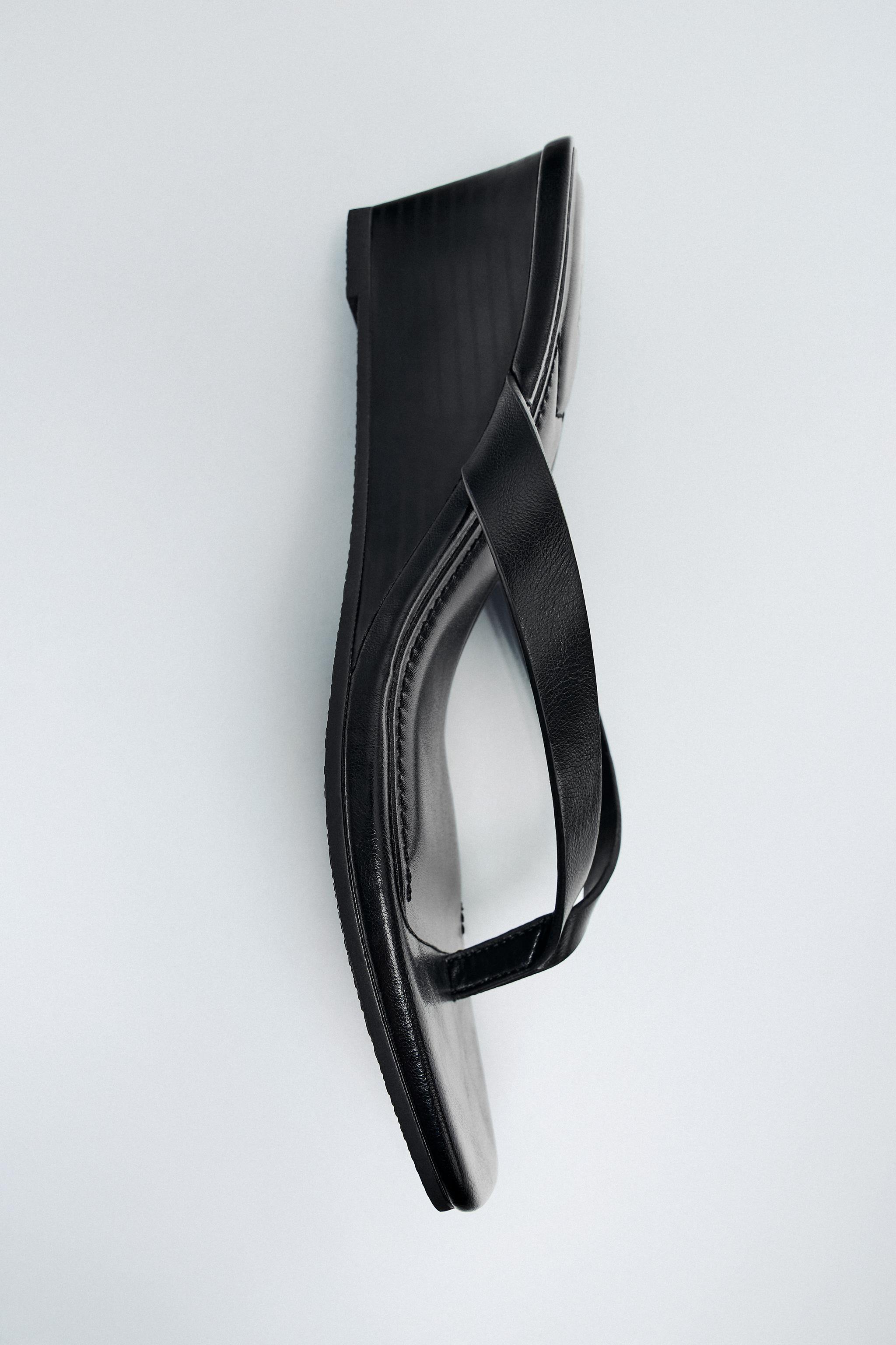 WEDGE HEELED SANDALS