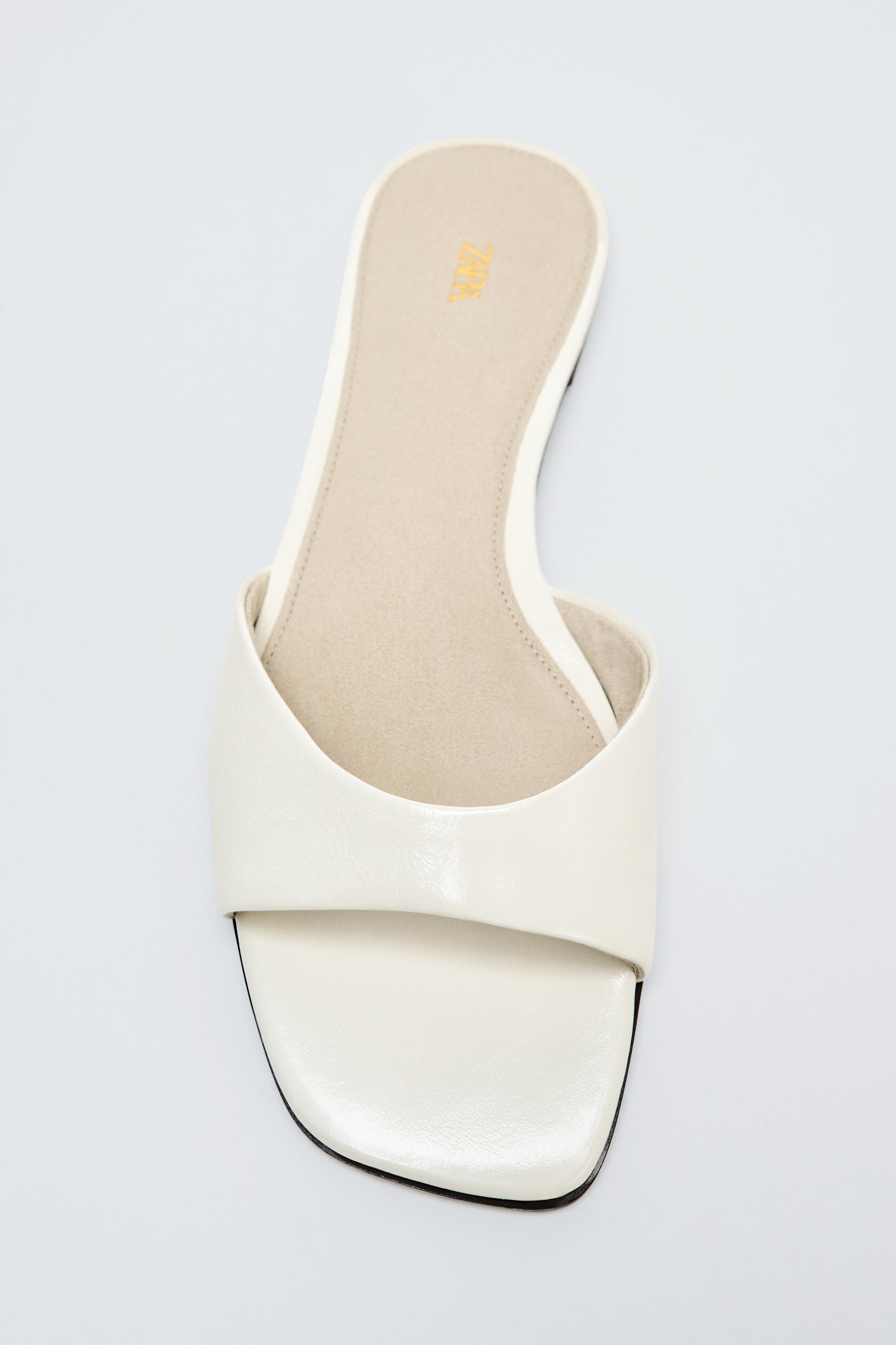 FLAT LEATHER SANDALS