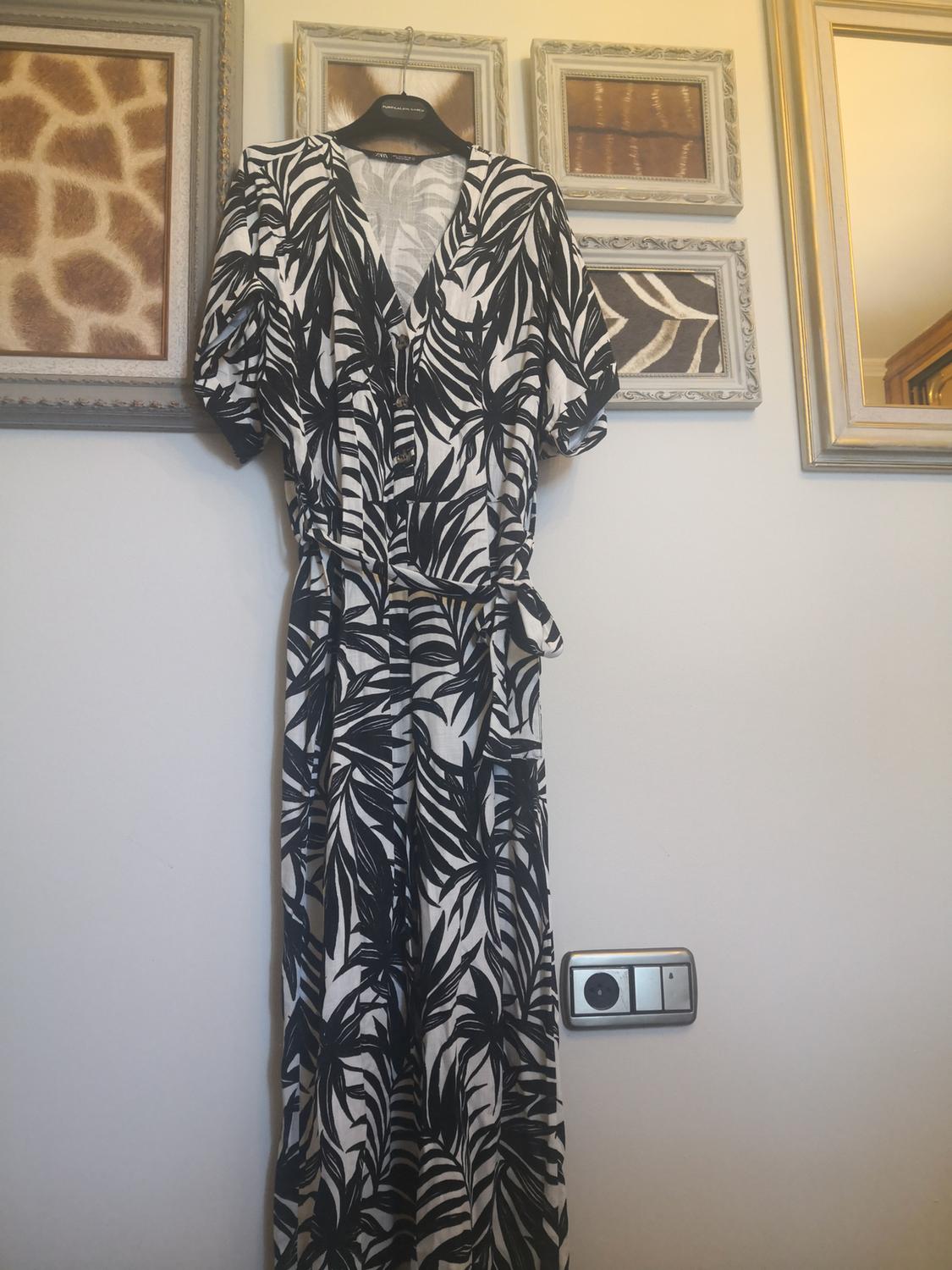 PRINTED JUMPSUIT WITH BELT