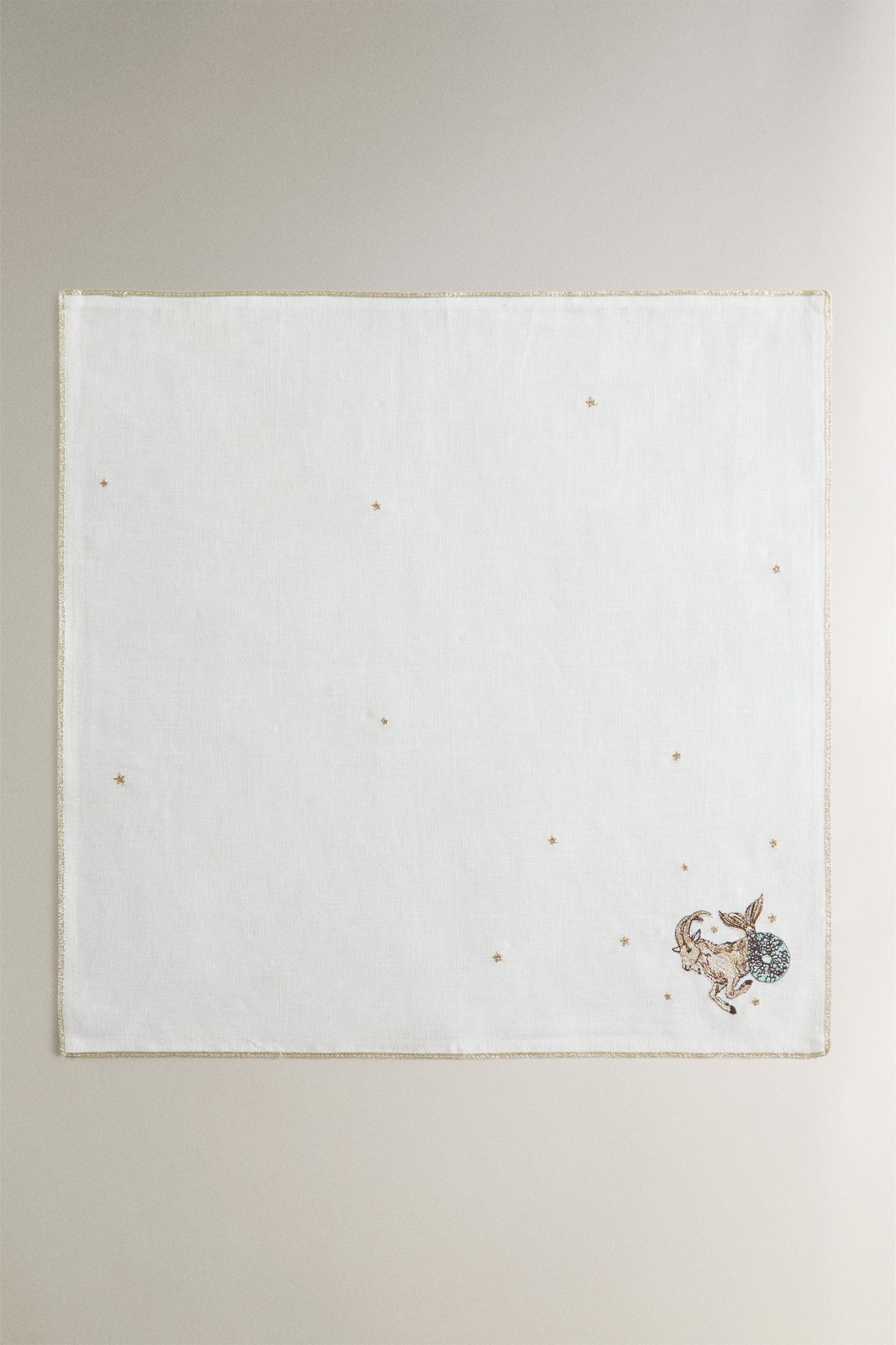 EMBROIDERED LINEN CAPRICORN NAPKIN | MARISA BERENSON — Ecru
