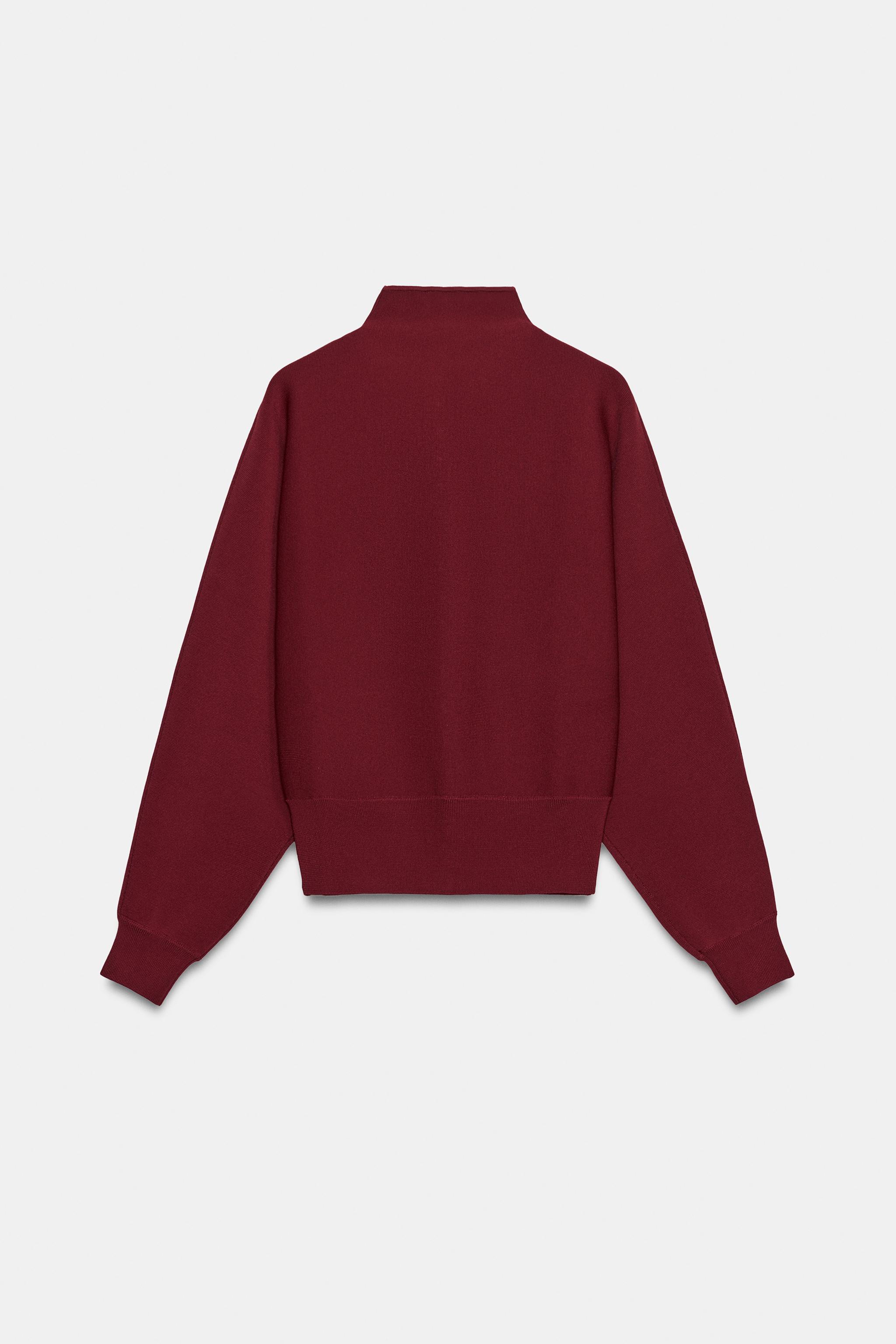 GILET EN MAILLE AVEC BOUTON REVÊTU
