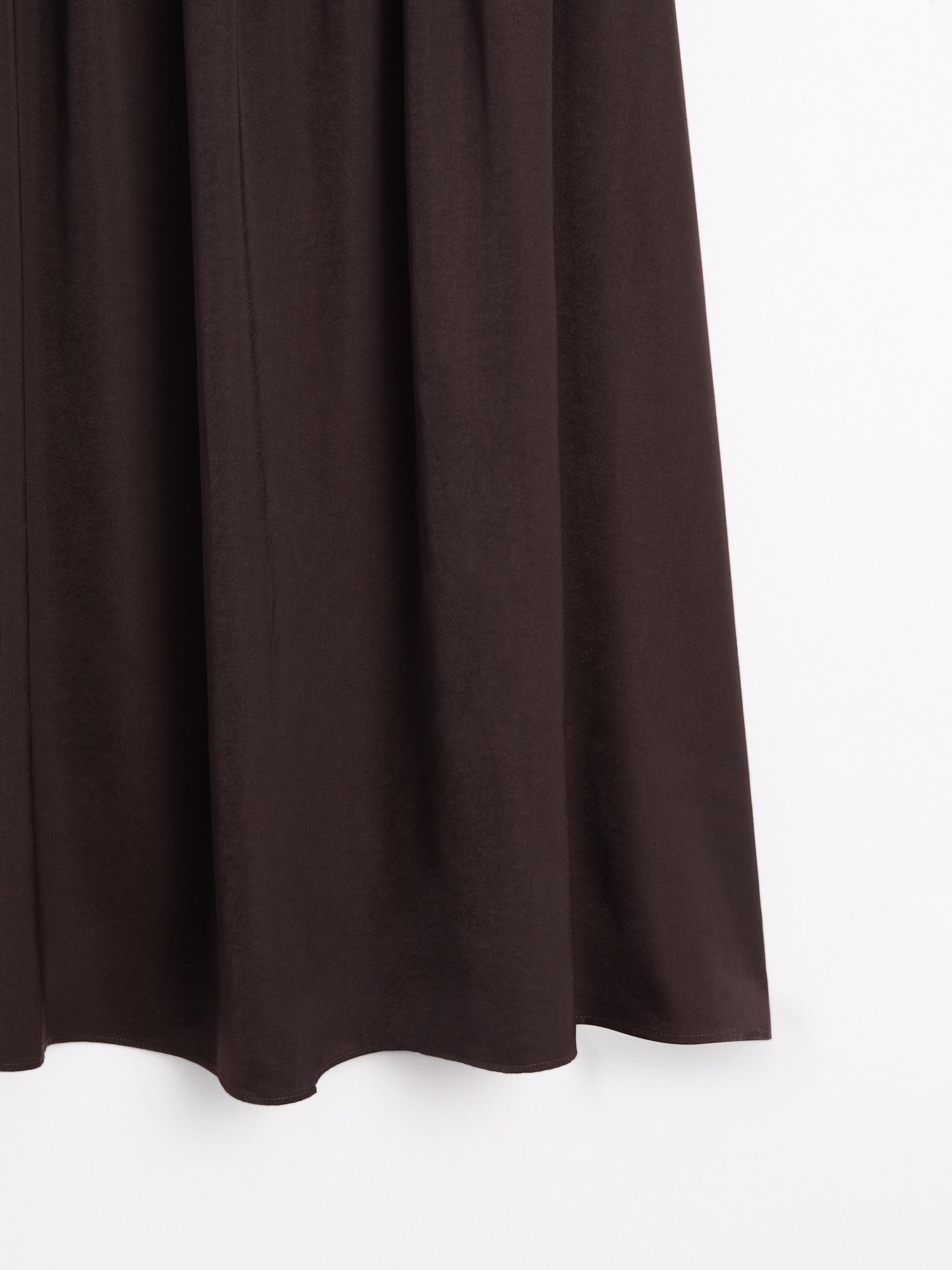 Jupe midi fluide combinée