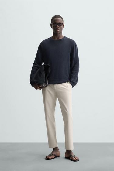 PANTALÓN CHINO ESTRUCTURA CONFORT - Arena claro de Zara - Imagen 0