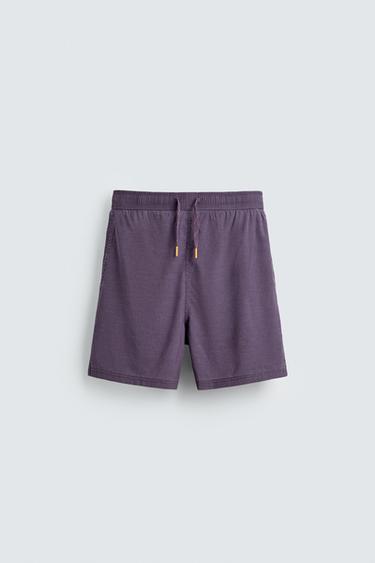 BAÑADOR TÉCNICO DELAVADO - Morado de Zara