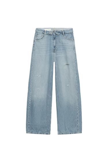 Front view of distressed blue straight-cut jeans with five pockets and a button and zipper closure.