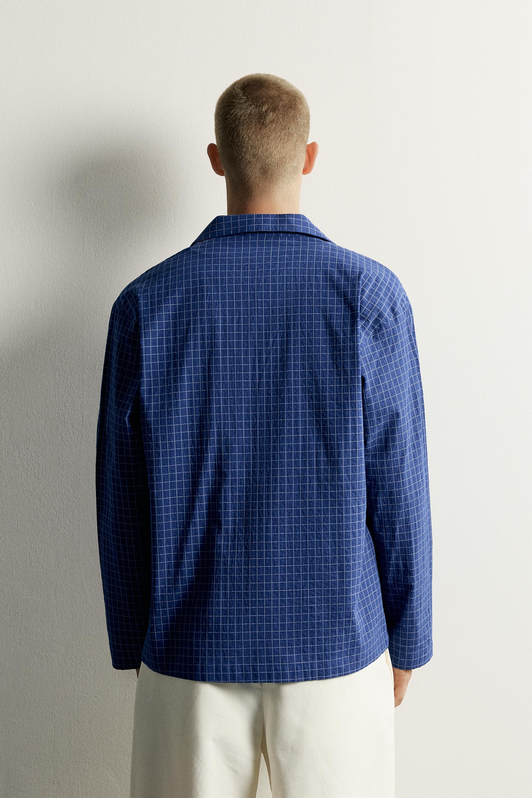 CHEMISE À CARREAUX ET FERMETURE BRANDEBOURGS