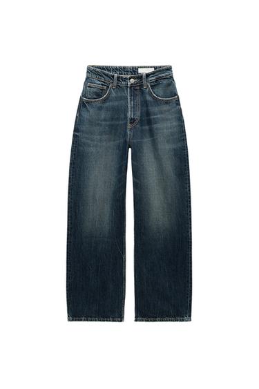 Front view of wide-leg blue jeans with front and back pockets.