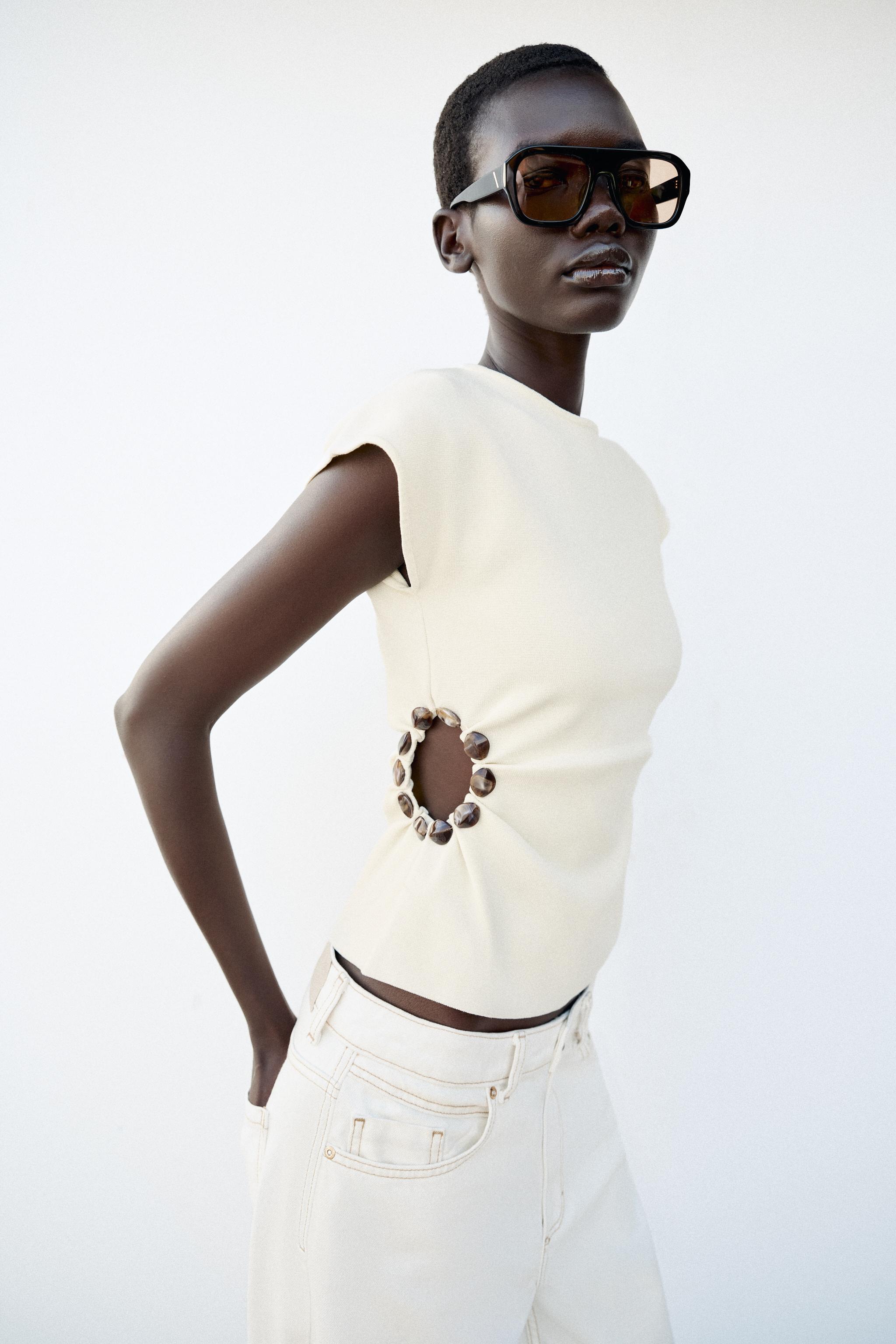 BEADED CUT OUT KNIT TOP