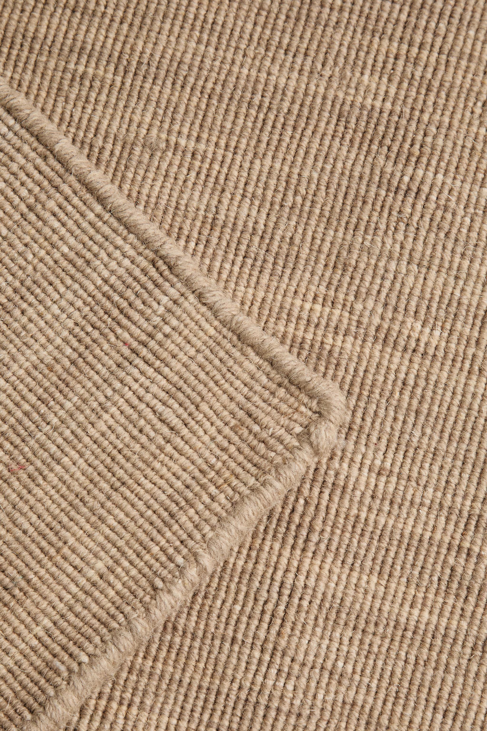COTTON AND WOOL KNOTTED AREA RUG