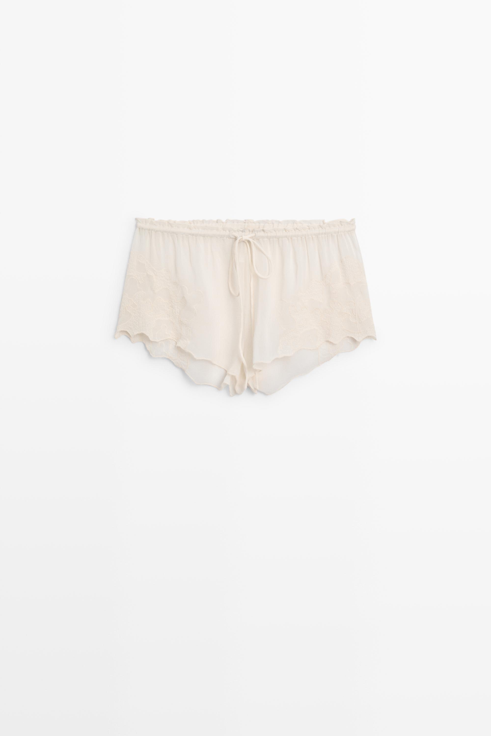 Flowing shorts with embroidered detail — Ecru
