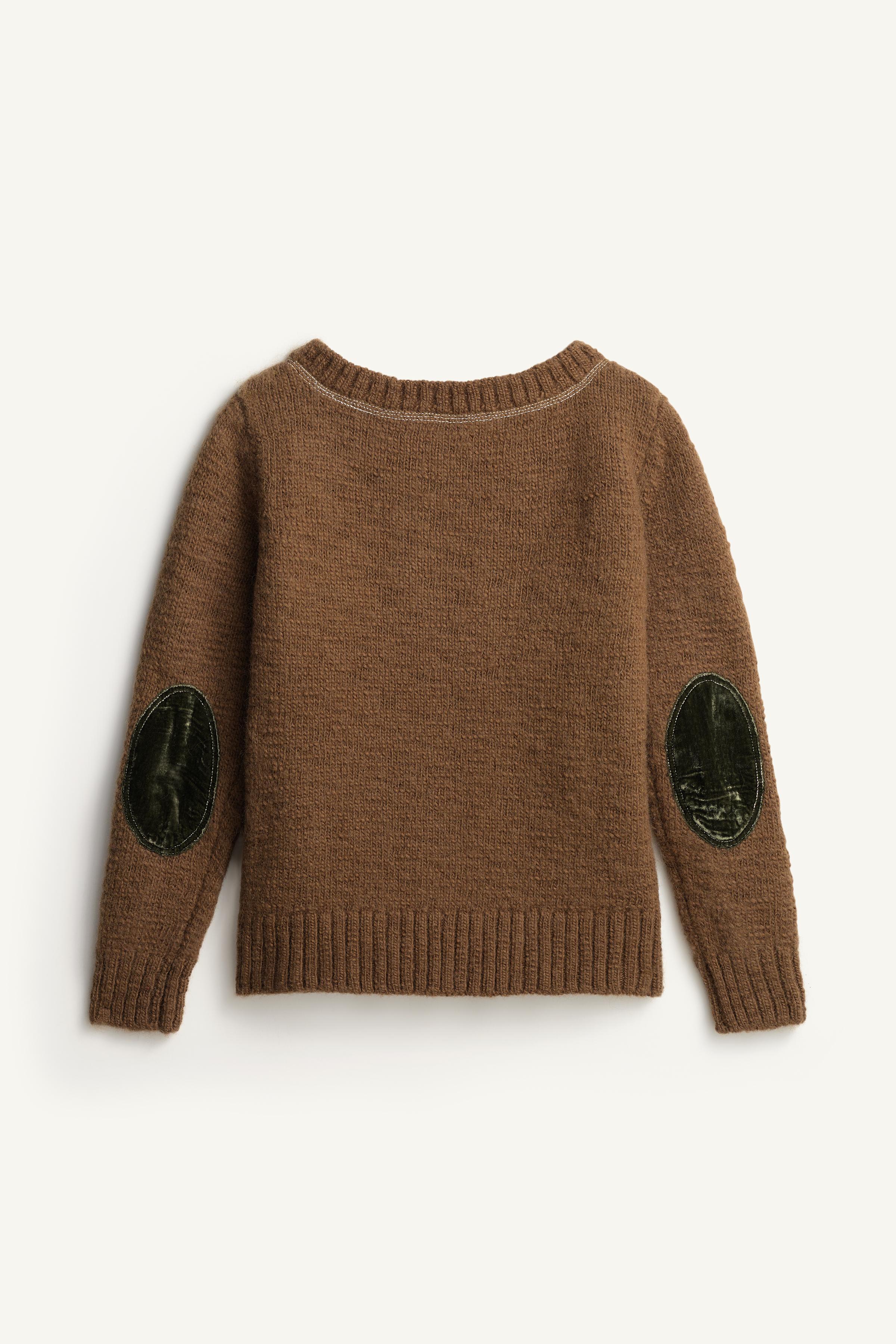 LIMITED EDITION WOOL SWEATER WITH BROOCH