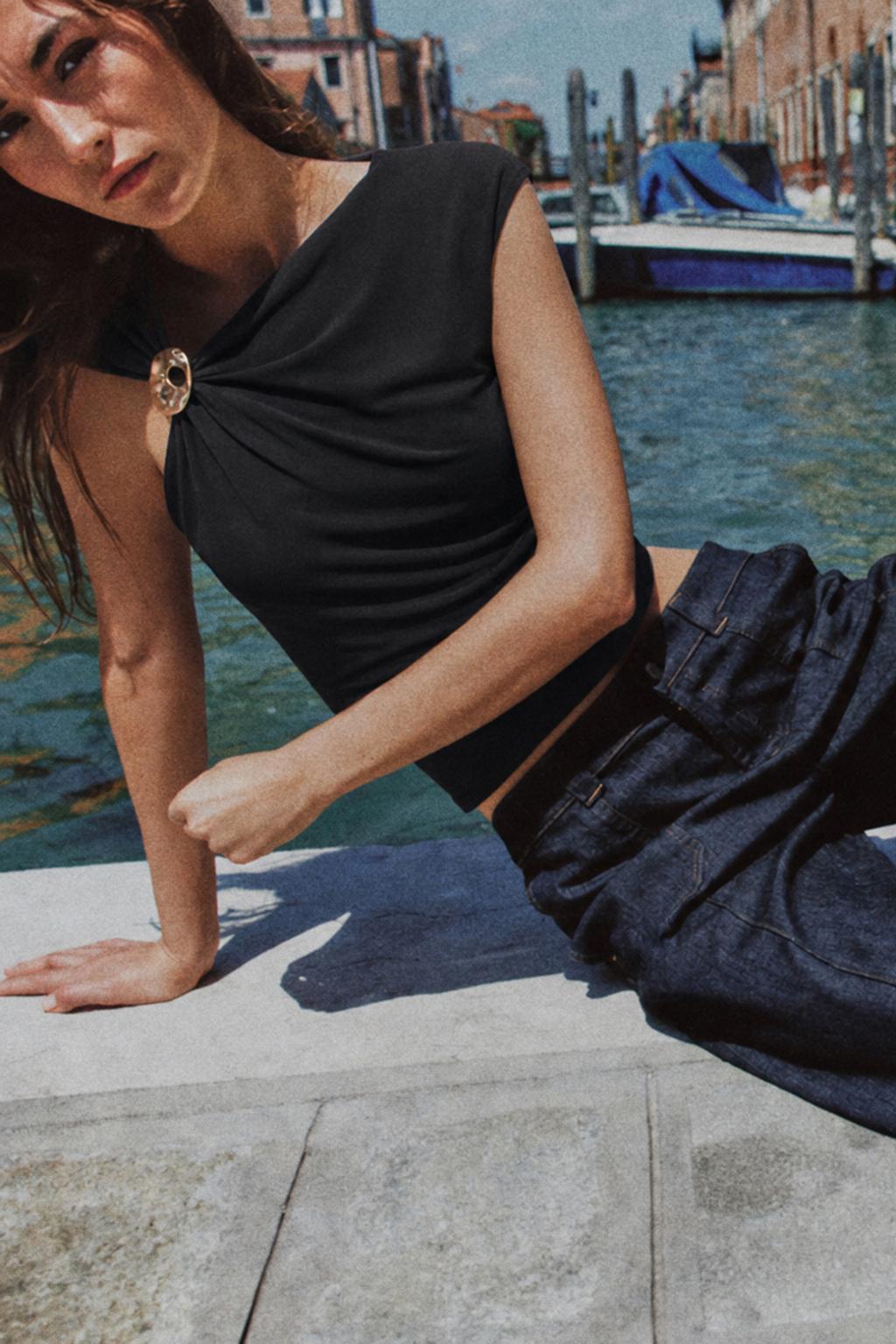 DRAPED TOP WITH EMBELLISHMENT