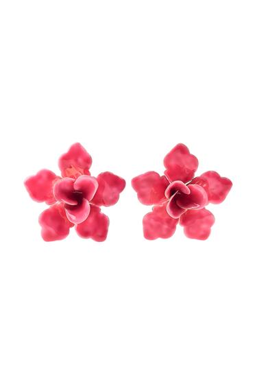 Red flower earrings with detailed petals.