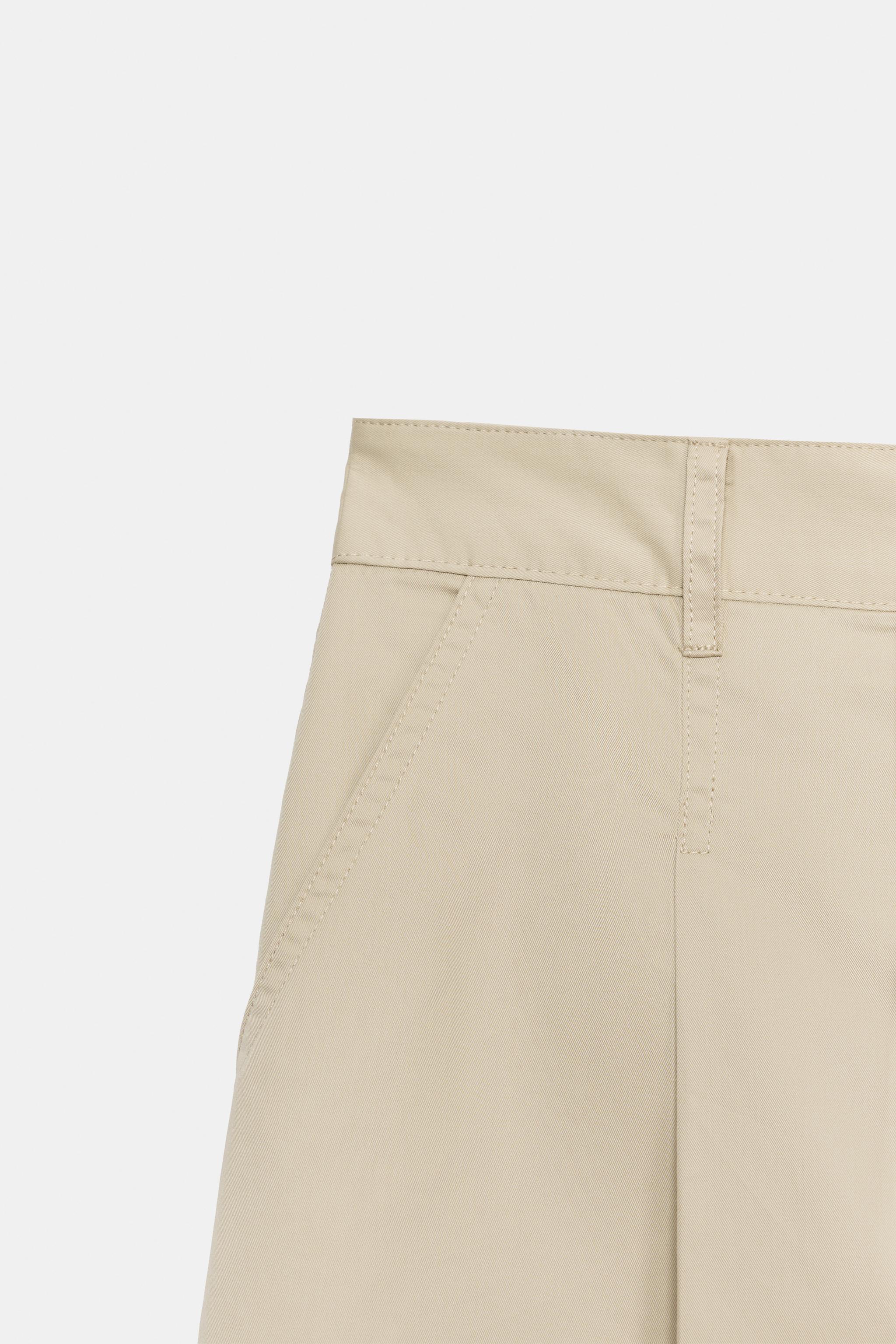 PLEATED MIDI SKIRT