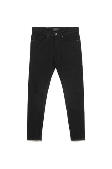 RIPPED SKINNY JEANS