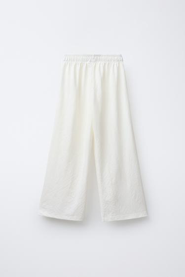 PANTALON FLUIDE À JAMBES LARGES - Écru de Zara - Image 1