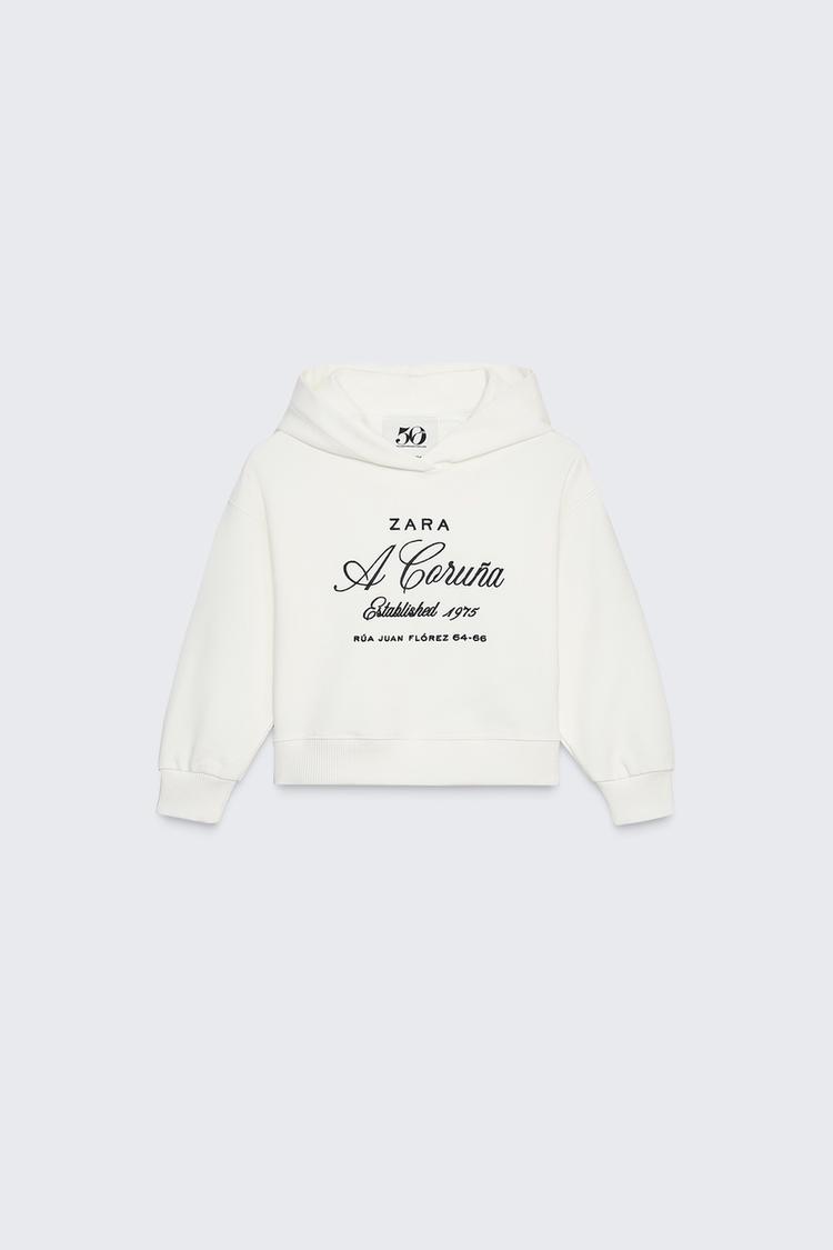 FELPA CAPPUCCIO CON SCRITTA RICAMATA 50TH ANNIVERSARY Bianco