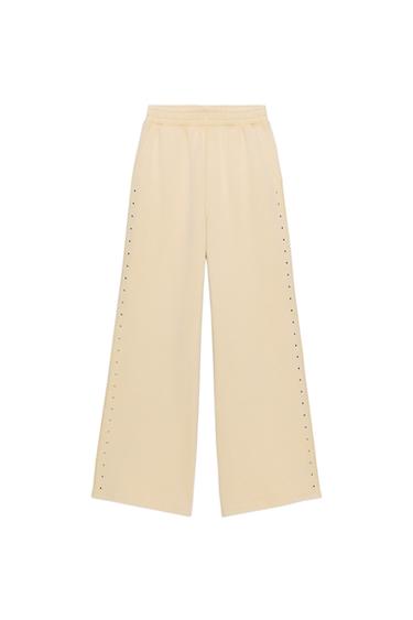 Zara WASHED EFFECT FLEECE PANTS WITH STUDS - Butter
