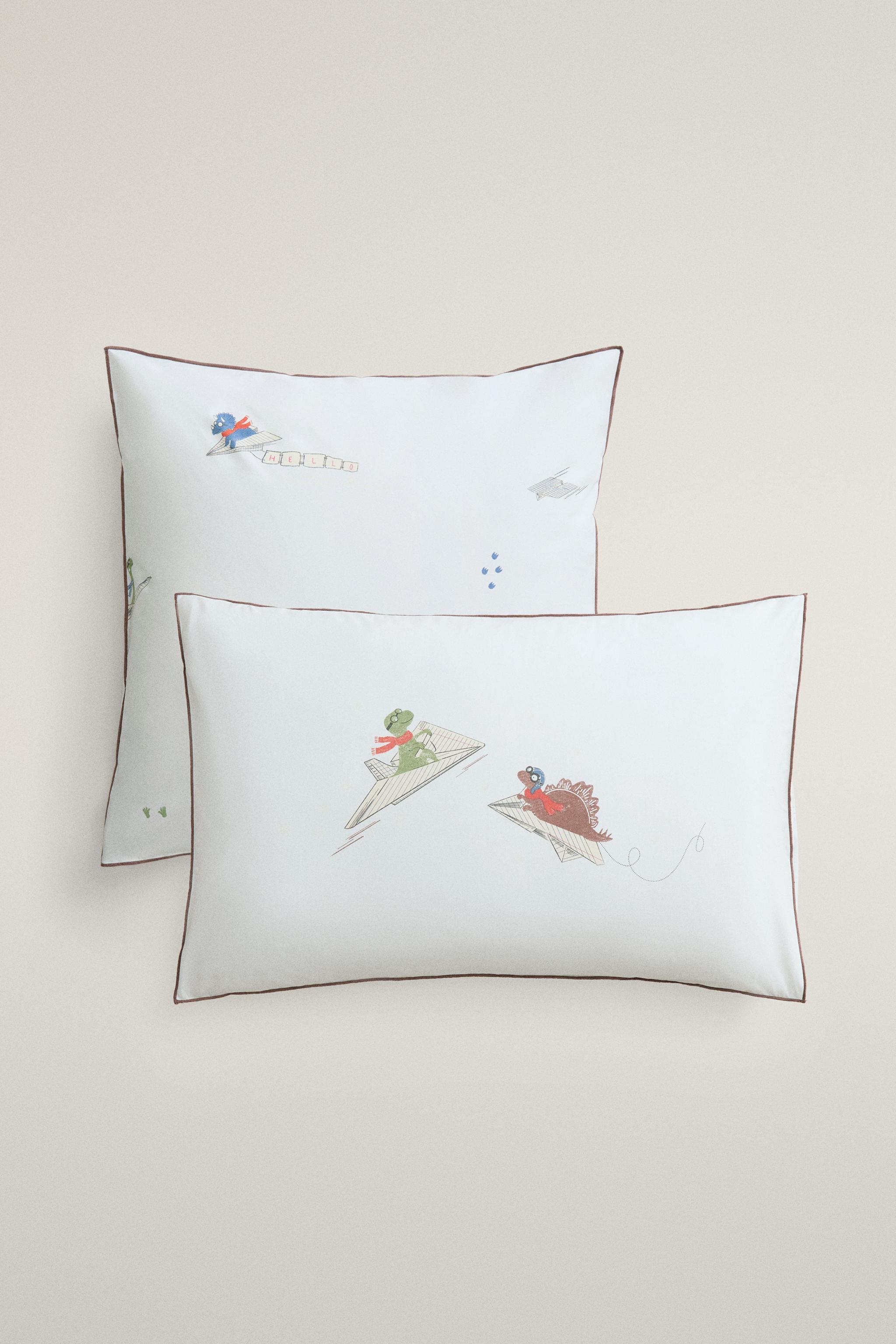 KIDS’ DINOSAUR PILLOWCASE — Light blue