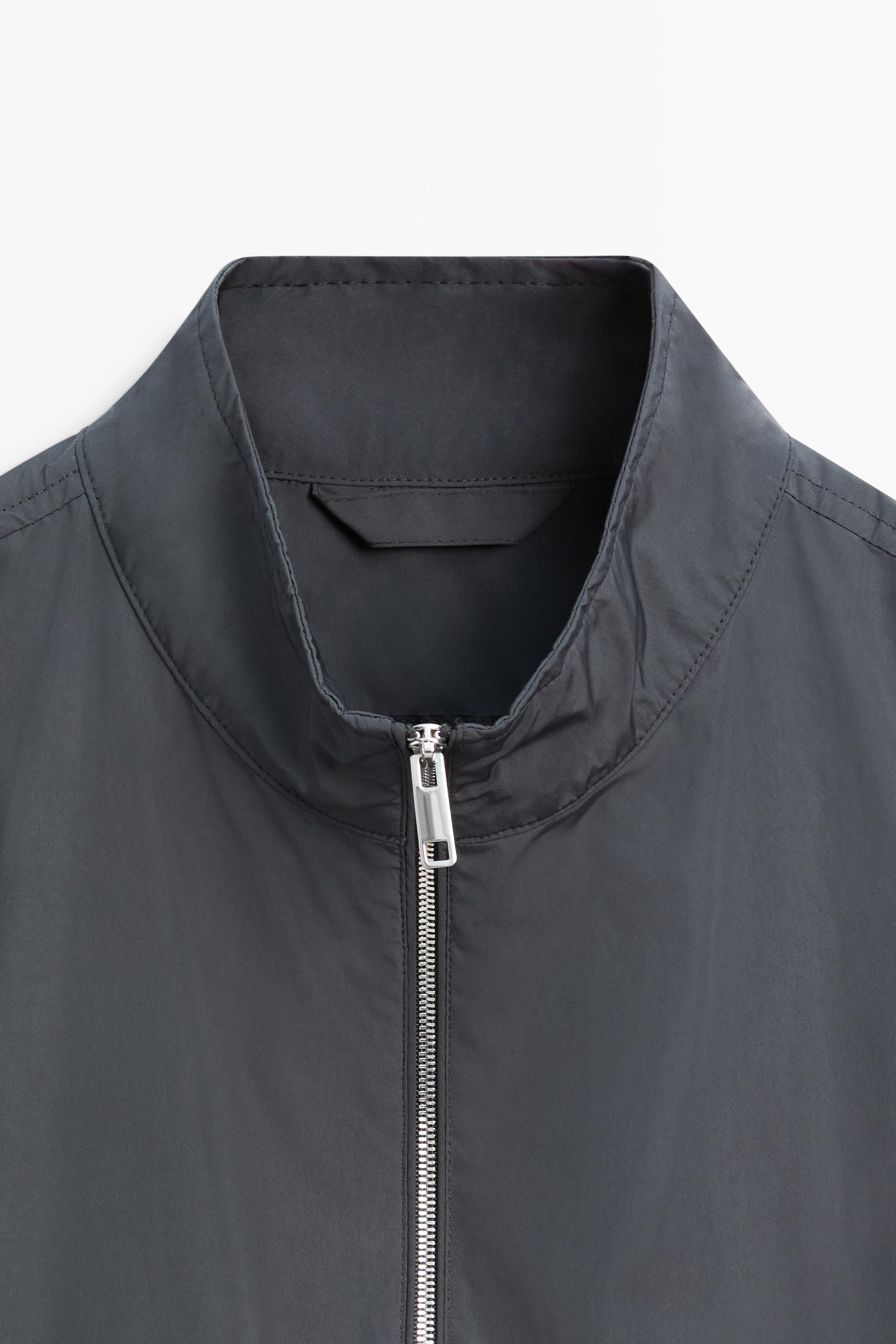 High neck jacket with pocket details
