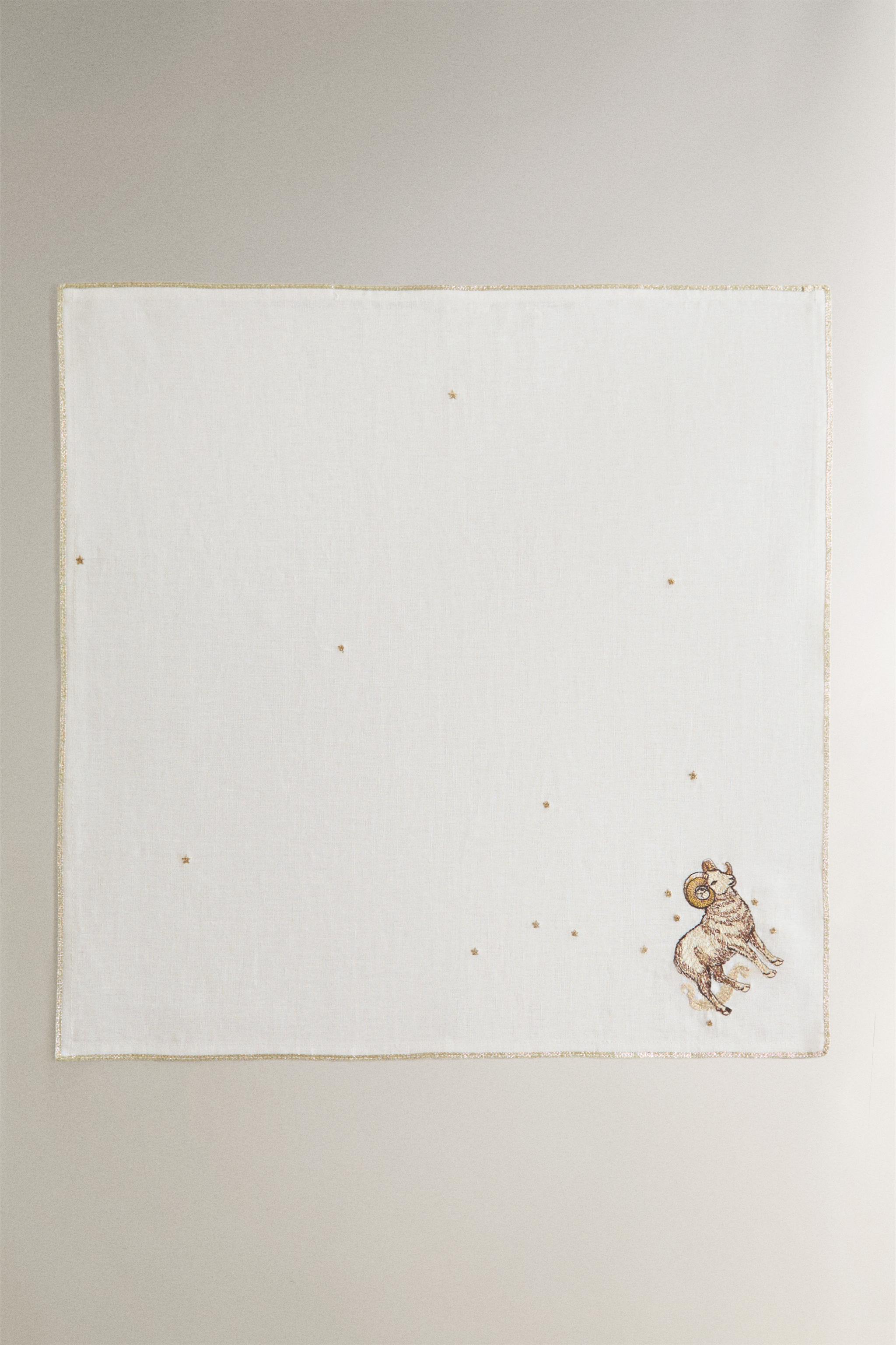 ARIES EMBROIDERED LINEN NAPKIN | MARISA BERENSON — Ecru