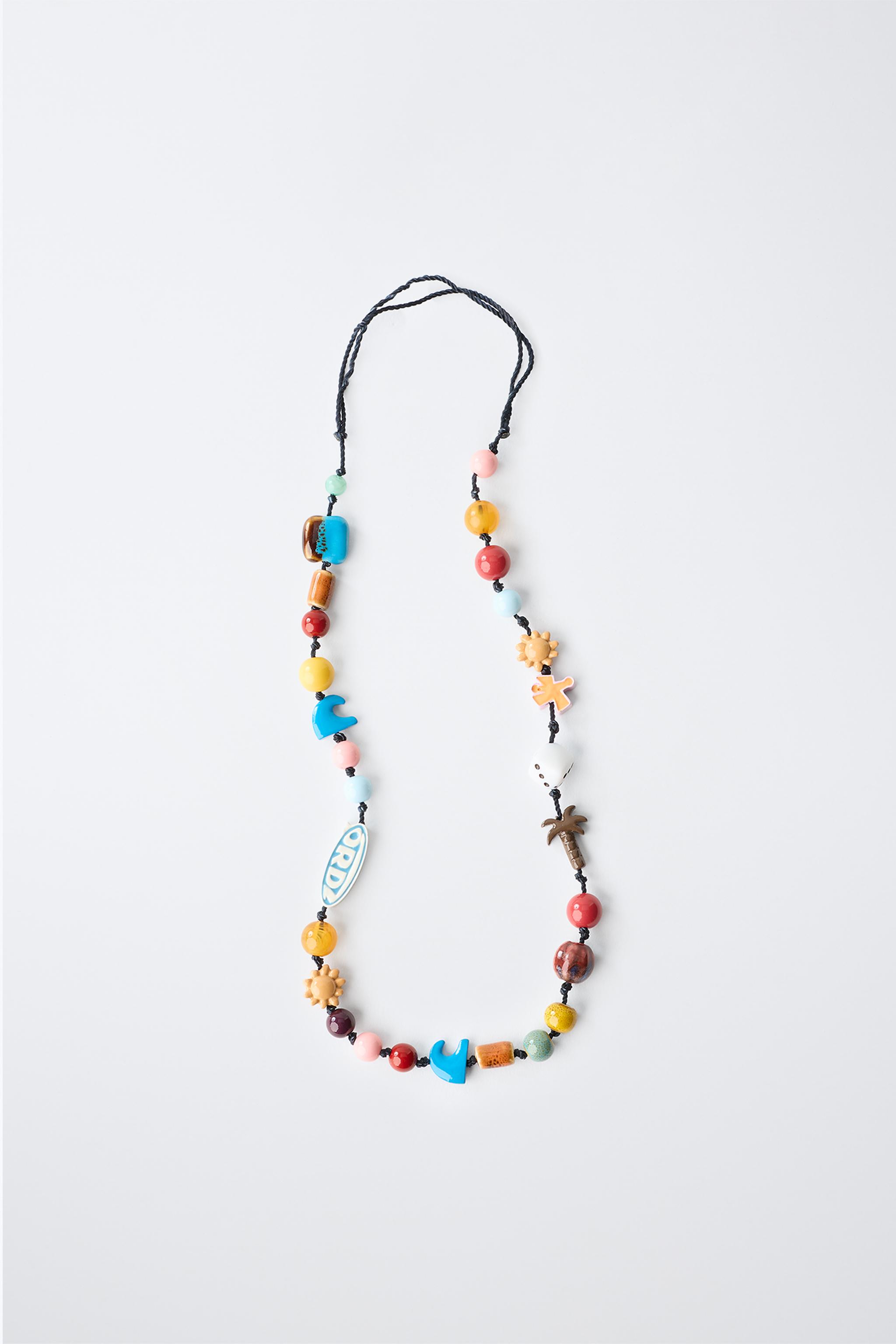 BEADED CORD NECKLACE WITH LOGO