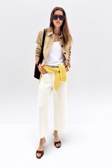 بنطلون واسع وقصير بحزام مضفر - خَام by Zara