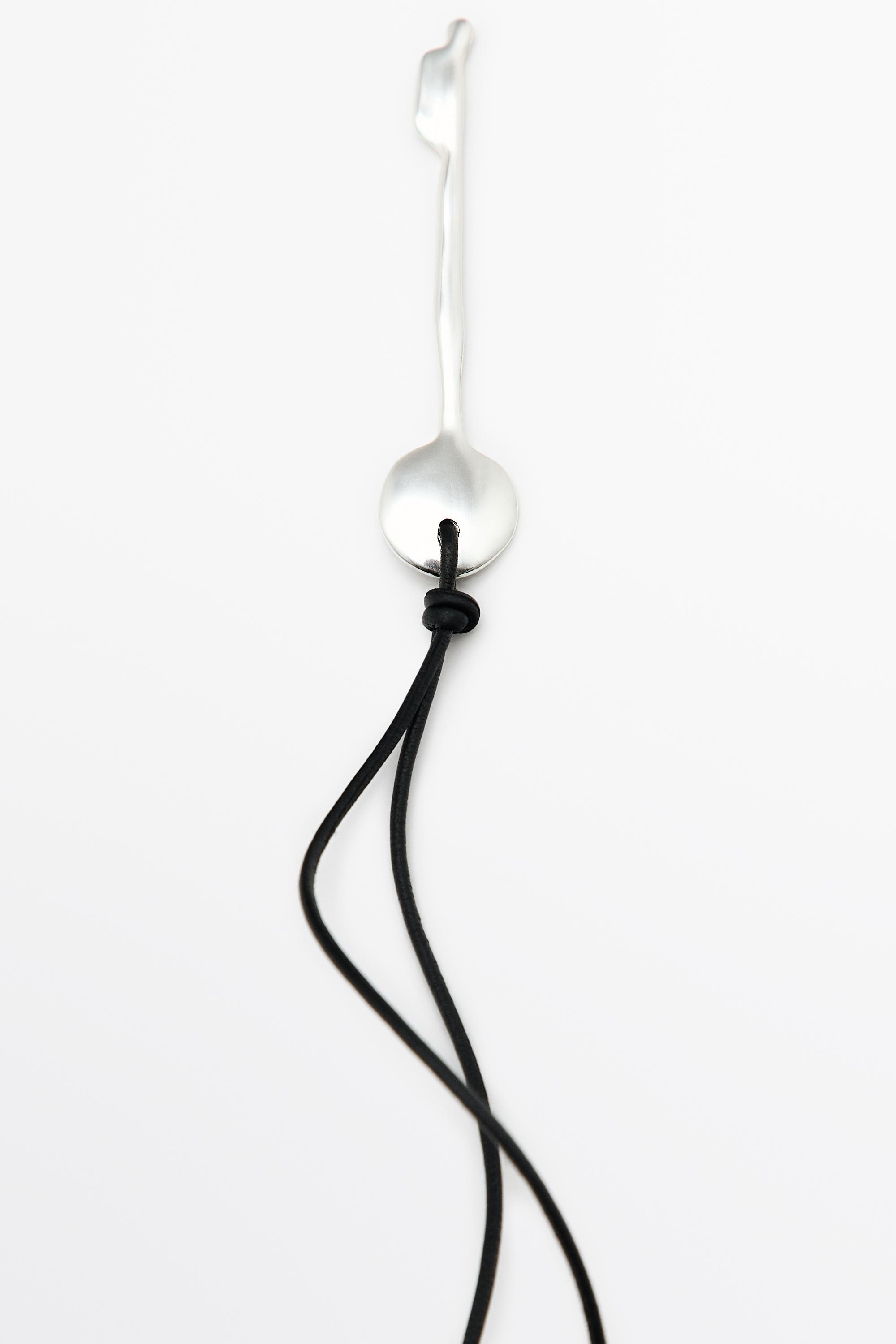 Collier pendentif clé