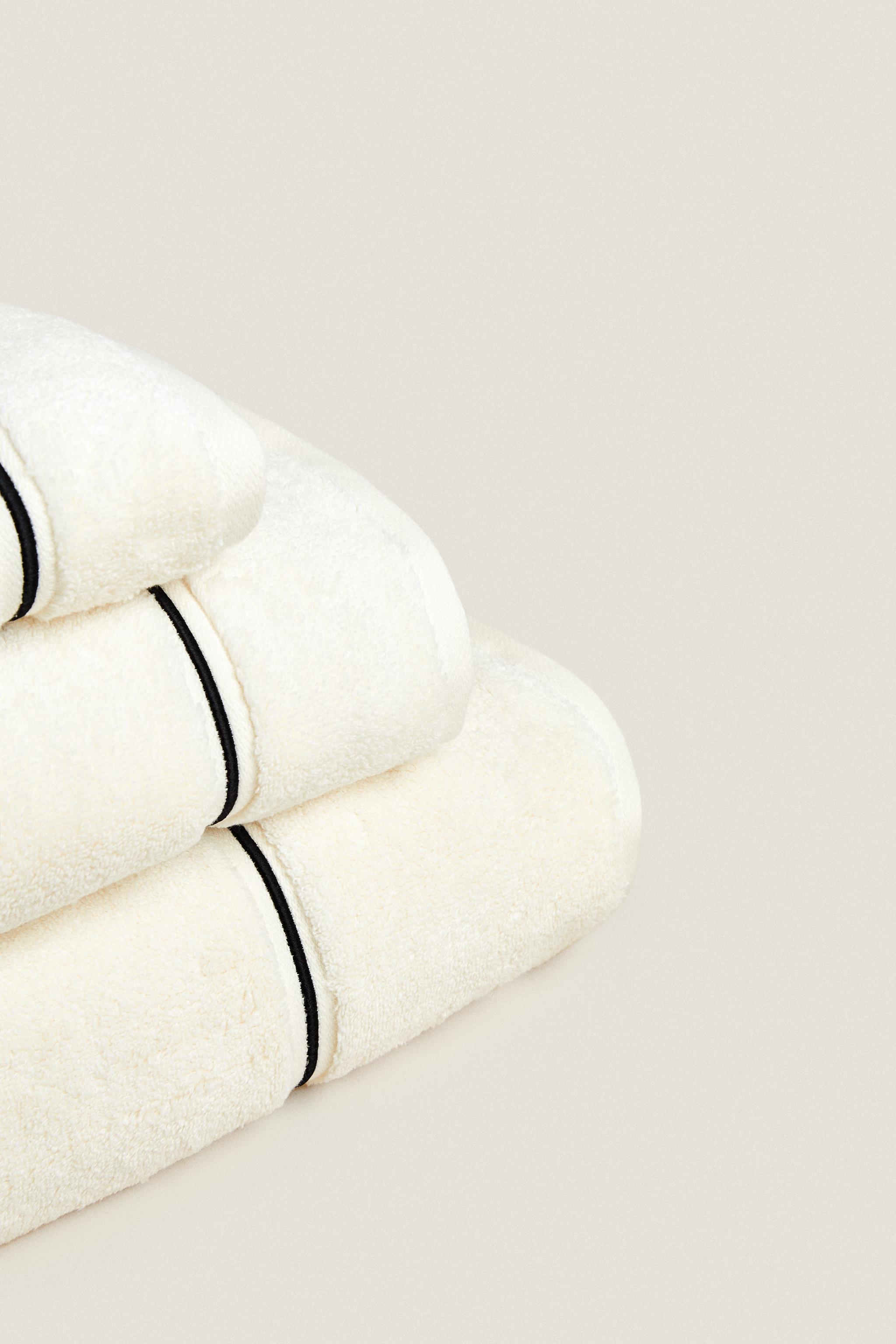 White bath towels on sale with black trim