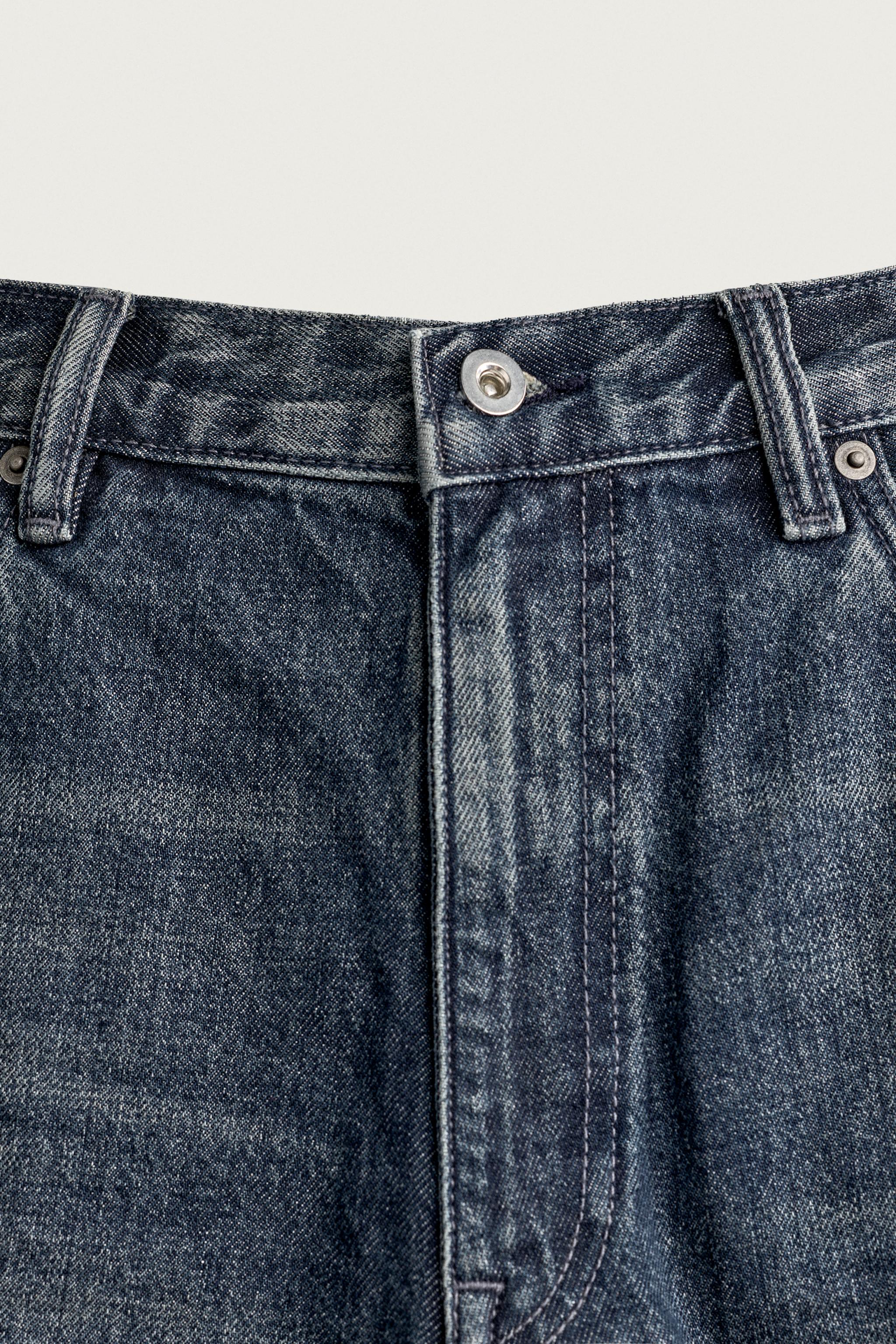 BAGGY FIT DENIM SHORTS WITH LEATHER POCKETS