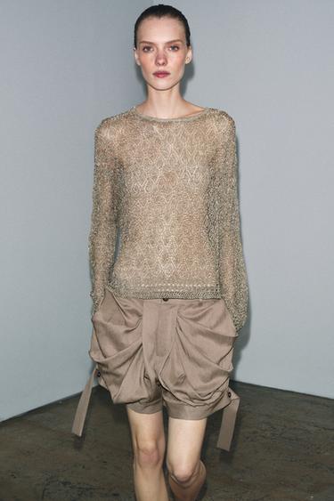 PULL EN MAILLE POINTELLE À FIL MÉTALLISÉ - Or de Zara - Image 1