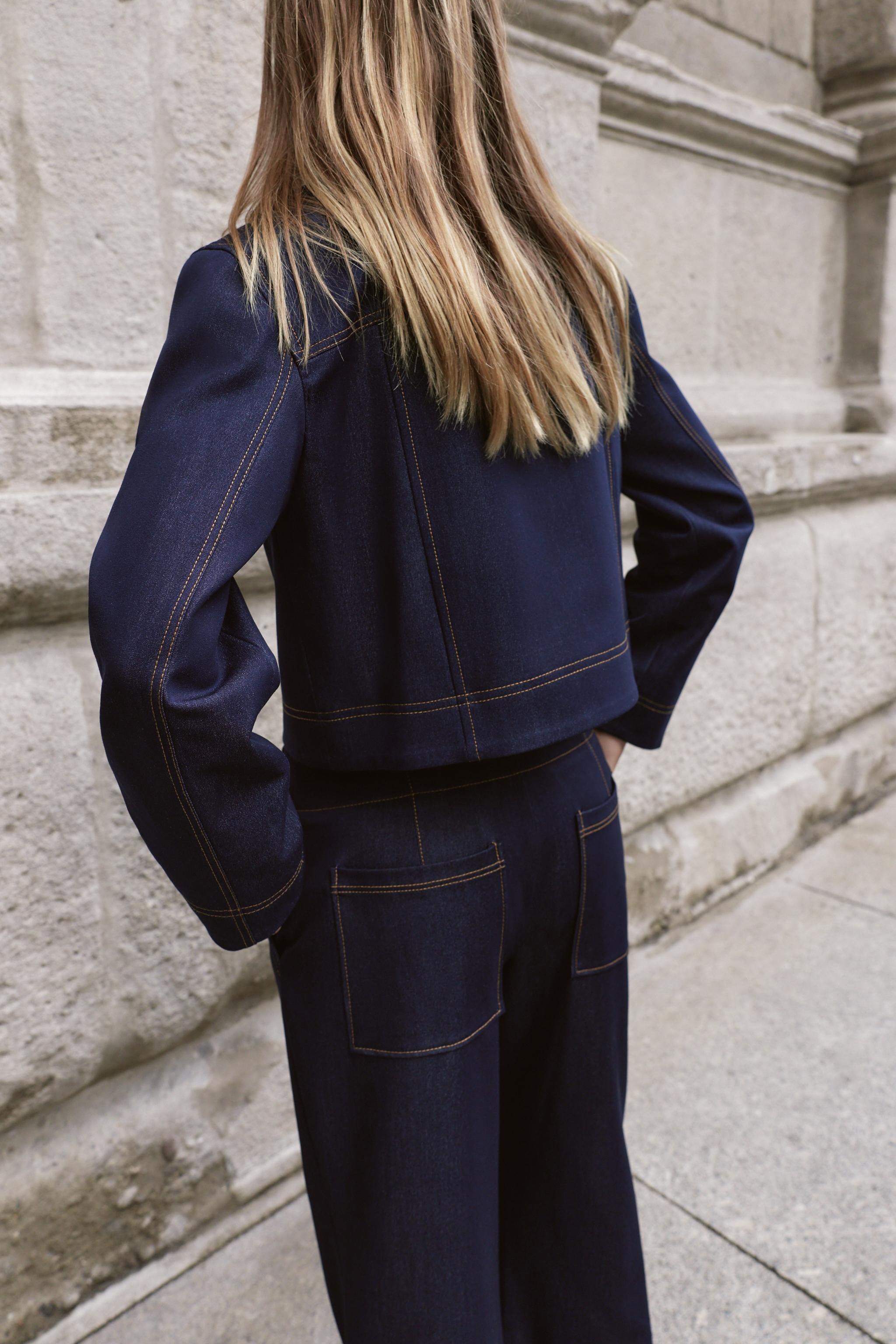 VESTE AVEC SURPIQÛRES À CONTRASTE