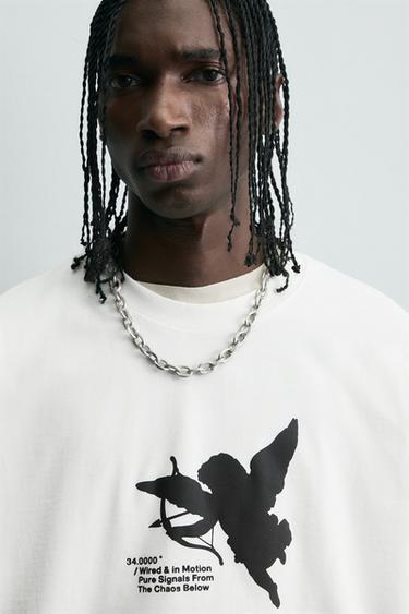 T-SHIRT IMPRIMÉS EFFET GOMMÉ - Blanc cassé de Zara - Image 4