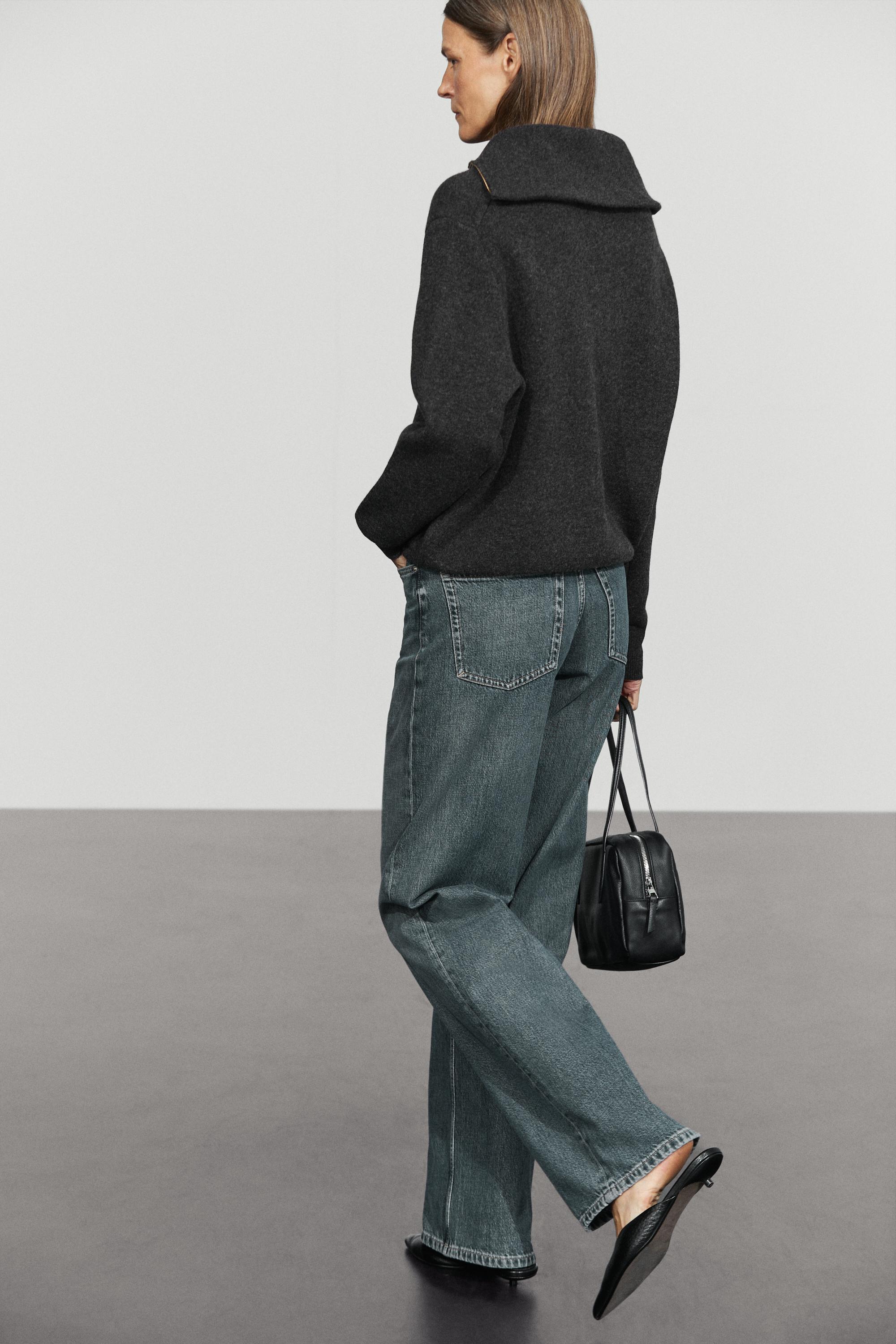 Wide collar zip-up knit sweater